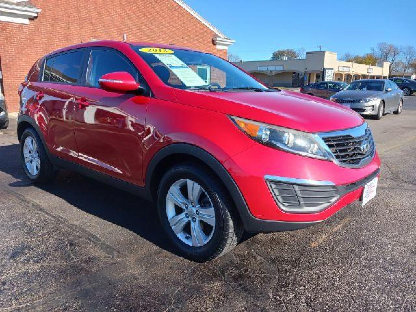 2013 Signal Red Kia Sportage LX FWD (KNDPB3A22D7) with an 2.4L V6 DOHC 24V engine, 6-Speed Automatic transmission, located at 1951 S Dayton Lakeview Rd., New Carlisle, OH, 45344, (937) 908-9800, 39.890999, -84.050255 - Photo#0