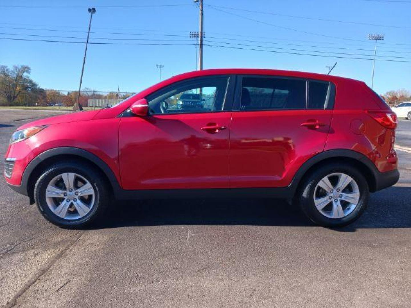 2013 Signal Red Kia Sportage LX FWD (KNDPB3A22D7) with an 2.4L V6 DOHC 24V engine, 6-Speed Automatic transmission, located at 1951 S Dayton Lakeview Rd., New Carlisle, OH, 45344, (937) 908-9800, 39.890999, -84.050255 - Photo#3