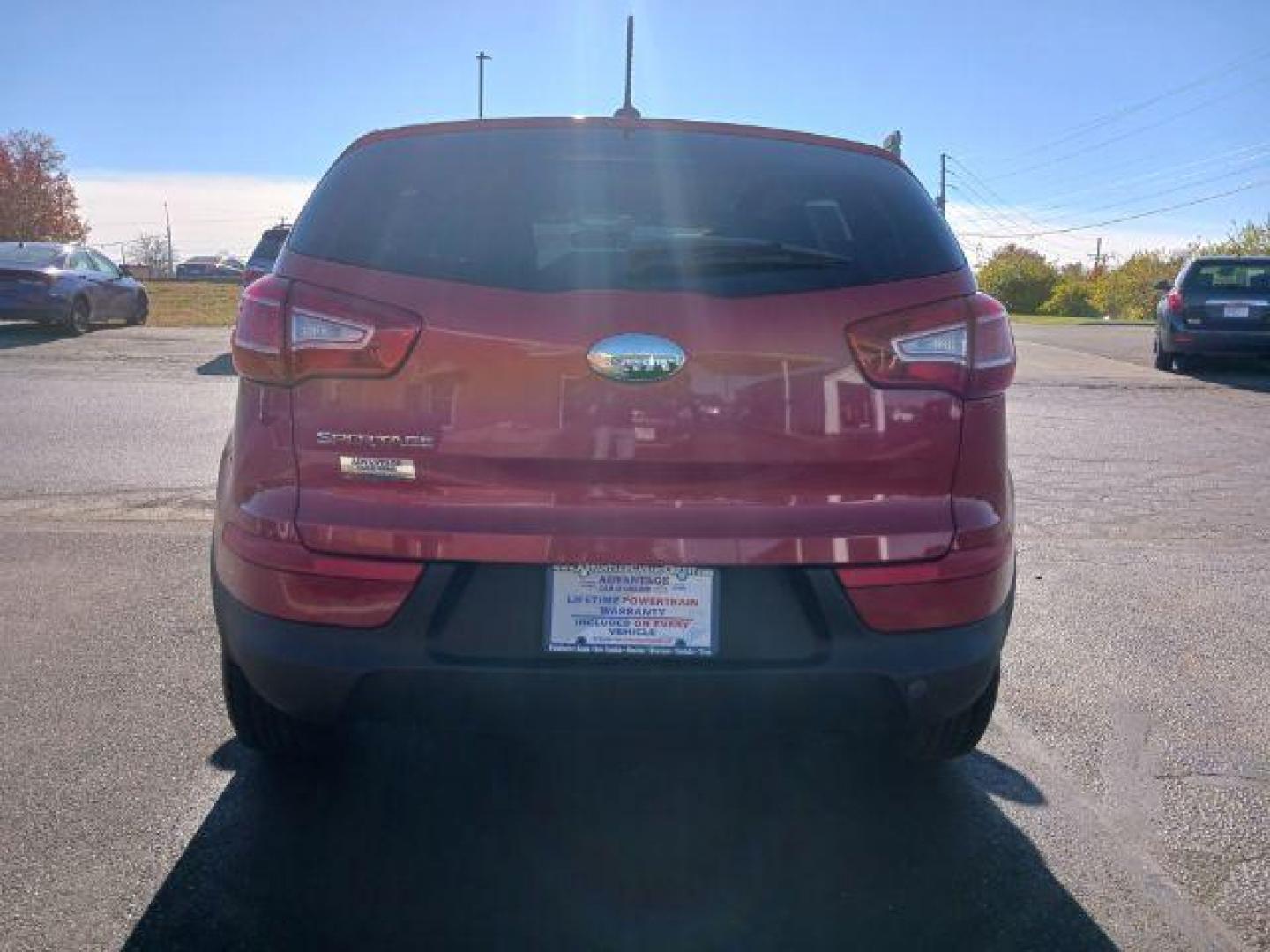 2013 Signal Red Kia Sportage LX FWD (KNDPB3A22D7) with an 2.4L V6 DOHC 24V engine, 6-Speed Automatic transmission, located at 1951 S Dayton Lakeview Rd., New Carlisle, OH, 45344, (937) 908-9800, 39.890999, -84.050255 - Photo#5