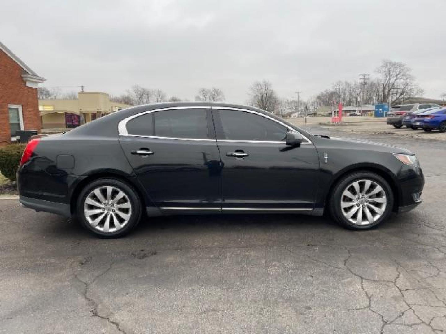 2013 Tuxedo Black Lincoln MKS FWD (1LNHL9DK0DG) with an 3.5L V6 DOHC 24V engine, 6-Speed Automatic transmission, located at 1230 East Main St, Xenia, OH, 45385, (937) 908-9800, 39.688026, -83.910172 - Photo#3