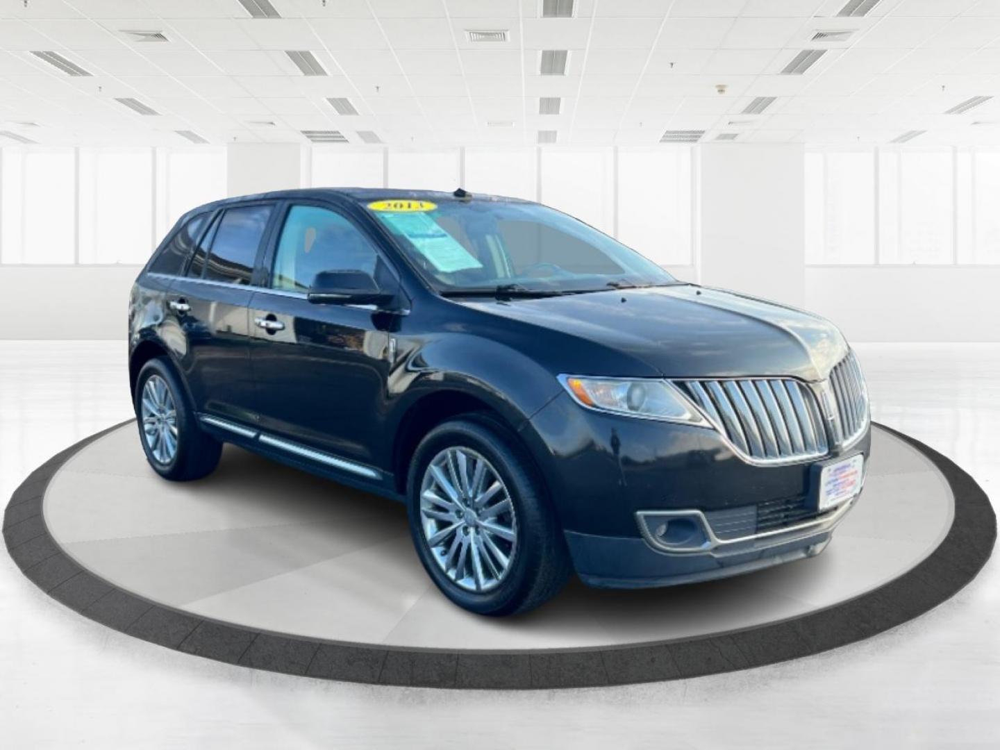 2013 Tuxedo Black Metallic Lincoln MKX (2LMDJ8JK8DB) with an 3.7L V6 DOHC 24V engine, 6-Speed Automatic transmission, located at 401 Woodman Dr, Riverside, OH, 45431, (937) 908-9800, 39.760899, -84.123421 - Photo#0