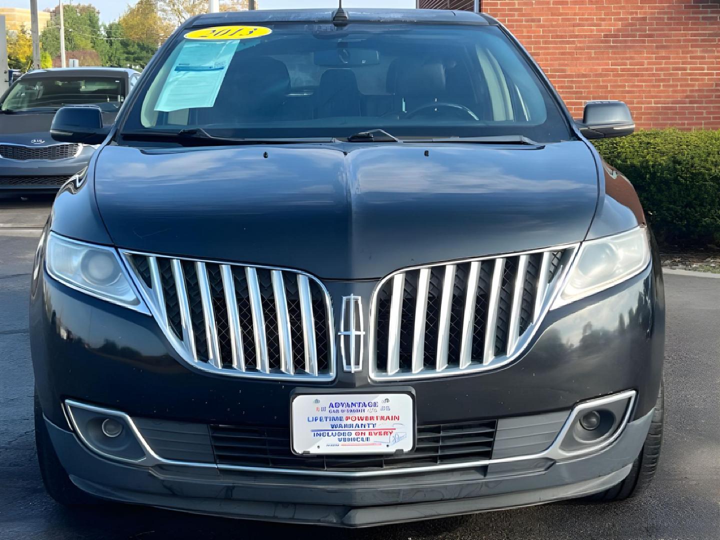 2013 Tuxedo Black Metallic Lincoln MKX (2LMDJ8JK8DB) with an 3.7L V6 DOHC 24V engine, 6-Speed Automatic transmission, located at 401 Woodman Dr, Riverside, OH, 45431, (937) 908-9800, 39.760899, -84.123421 - Photo#5