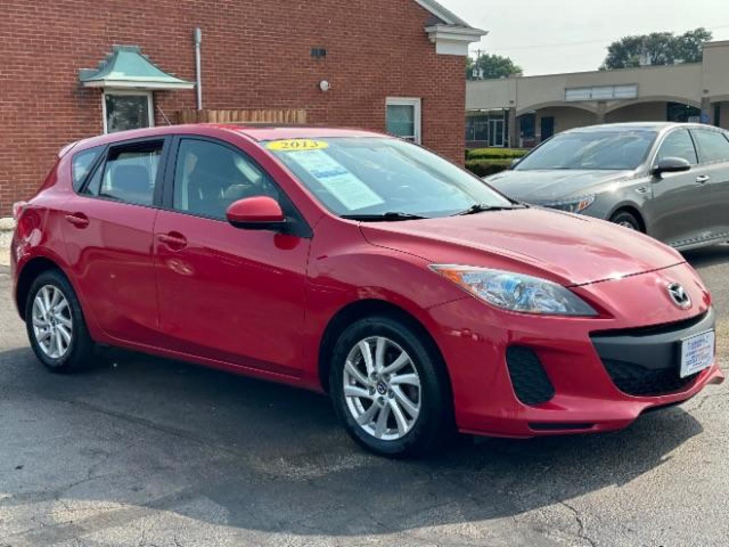 2013 Velocity Red Mica Mazda MAZDA3 i Touring AT 5-Door (JM1BL1L78D1) with an 2.0L L4 DOHC 16V engine, 5-Speed Automatic transmission, located at 1230 East Main St, Xenia, OH, 45385, (937) 908-9800, 39.688026, -83.910172 - Photo#0