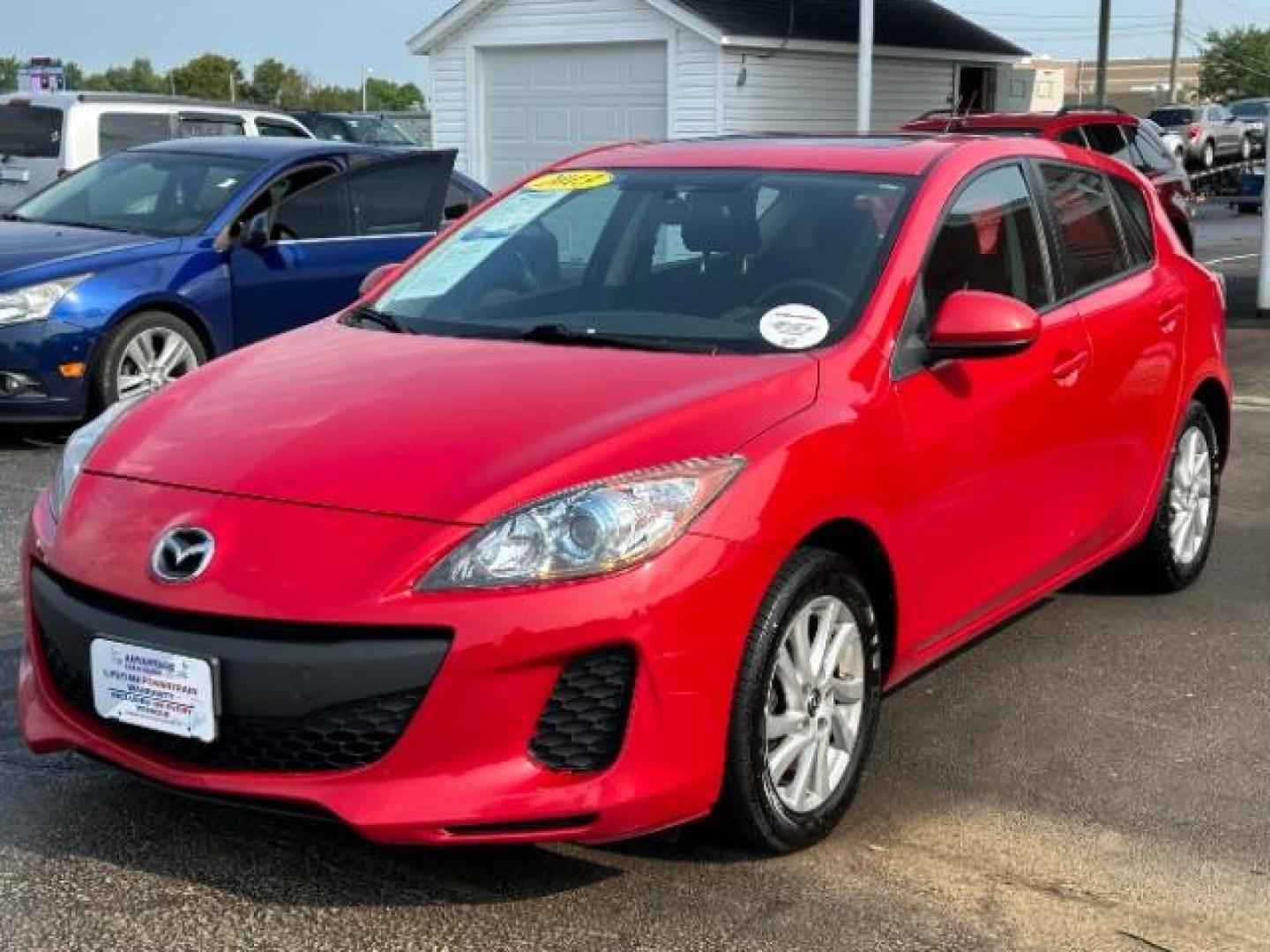 2013 Velocity Red Mica Mazda MAZDA3 i Touring AT 5-Door (JM1BL1L78D1) with an 2.0L L4 DOHC 16V engine, 5-Speed Automatic transmission, located at 1230 East Main St, Xenia, OH, 45385, (937) 908-9800, 39.688026, -83.910172 - Photo#2