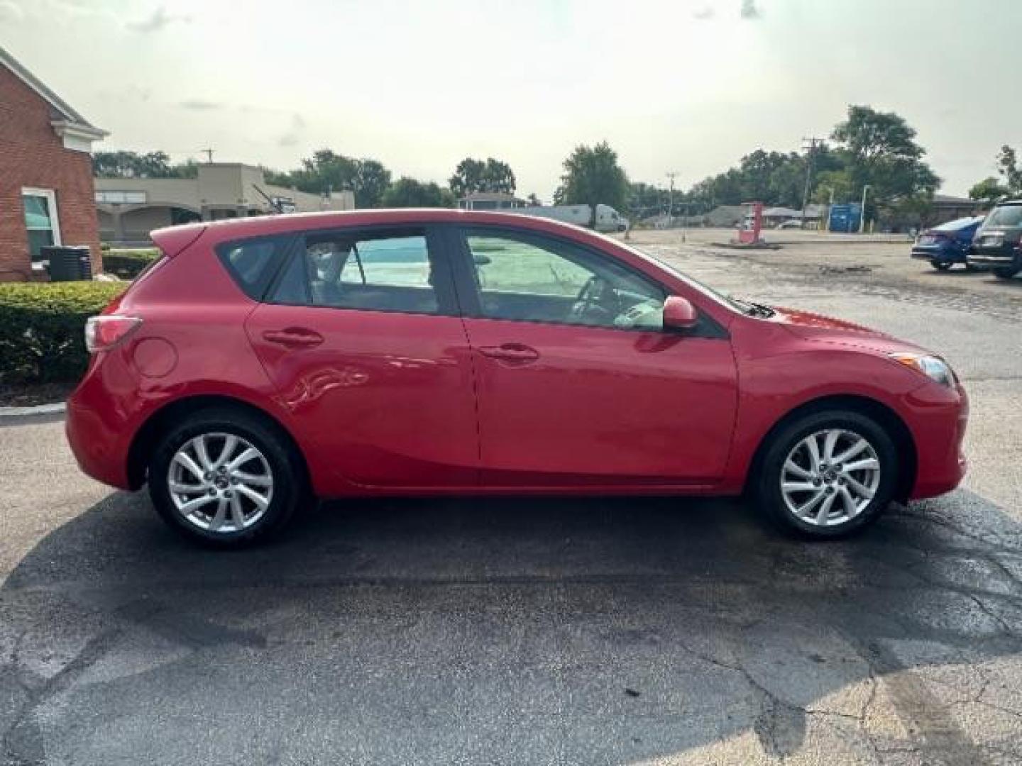 2013 Velocity Red Mica Mazda MAZDA3 i Touring AT 5-Door (JM1BL1L78D1) with an 2.0L L4 DOHC 16V engine, 5-Speed Automatic transmission, located at 1230 East Main St, Xenia, OH, 45385, (937) 908-9800, 39.688026, -83.910172 - Photo#5