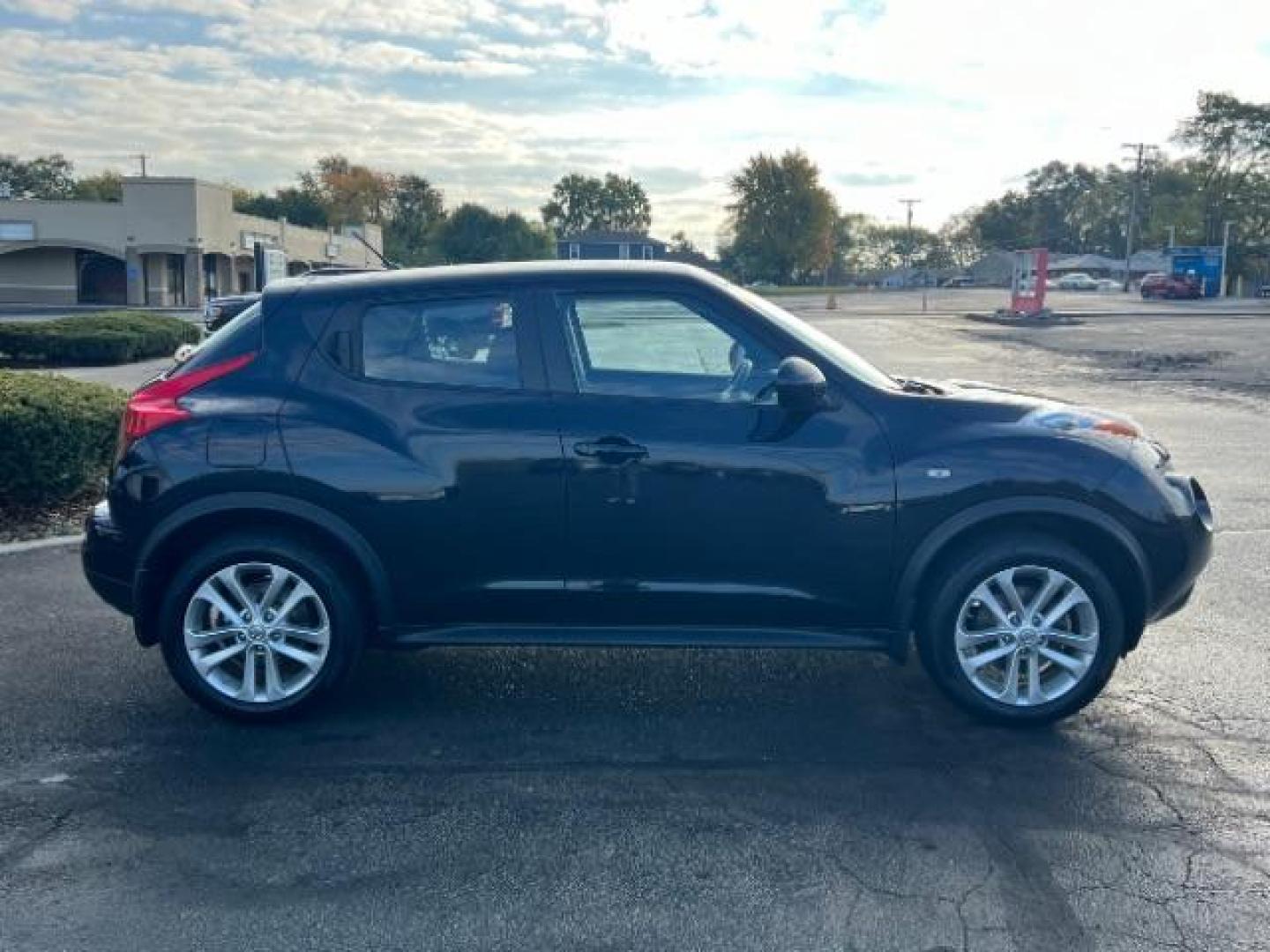 2013 Sapphire Black Nissan Juke S AWD (JN8AF5MV2DT) with an 1.6L L4 DOHC 16V engine, Continuously Variable Transmission transmission, located at 1099 N County Rd 25A, Troy, OH, 45373, (937) 908-9800, 40.057079, -84.212883 - Photo#4