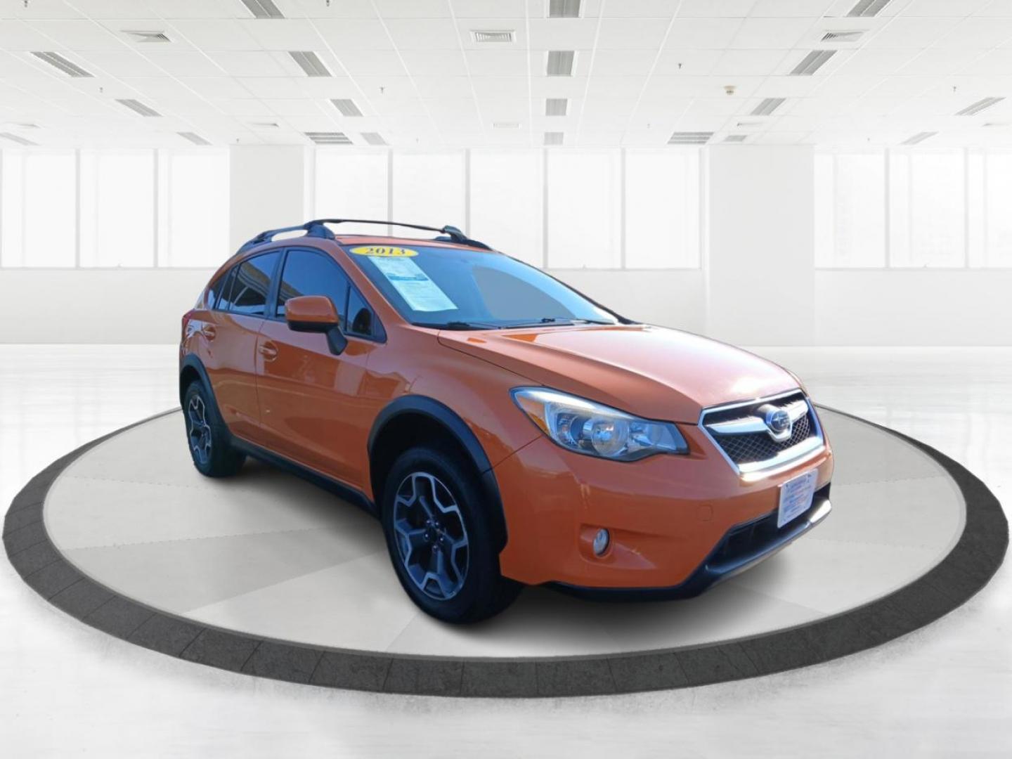 2013 Tangerine Orange Pearl Subaru XV Crosstrek 2.0 Limited (JF2GPAGC1D2) with an 2.0L L4 DOHC 16V engine, Continuously Variable Transmission transmission, located at 1099 N County Rd 25A, Troy, OH, 45373, (937) 908-9800, 40.057079, -84.212883 - Photo#0