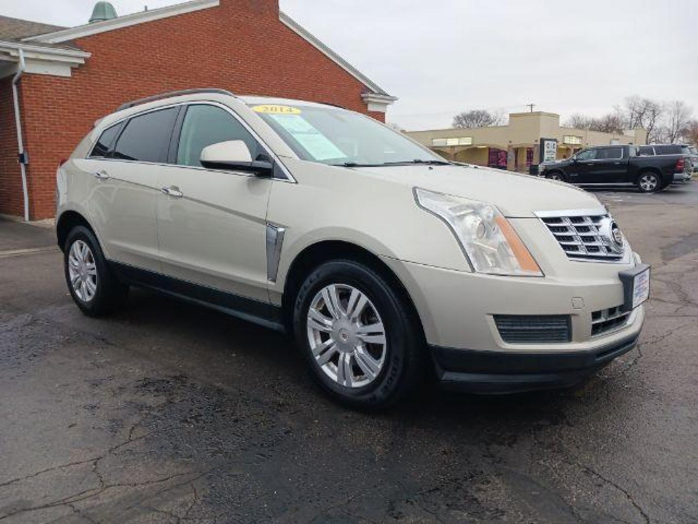 2014 Terra Mocha Metallic Cadillac SRX Standard FWD (3GYFNAE3XES) with an 3.6L V6 DOHC 24V FFV engine, 6-Speed Automatic transmission, located at 401 Woodman Dr, Riverside, OH, 45431, (937) 908-9800, 39.760899, -84.123421 - Photo#0