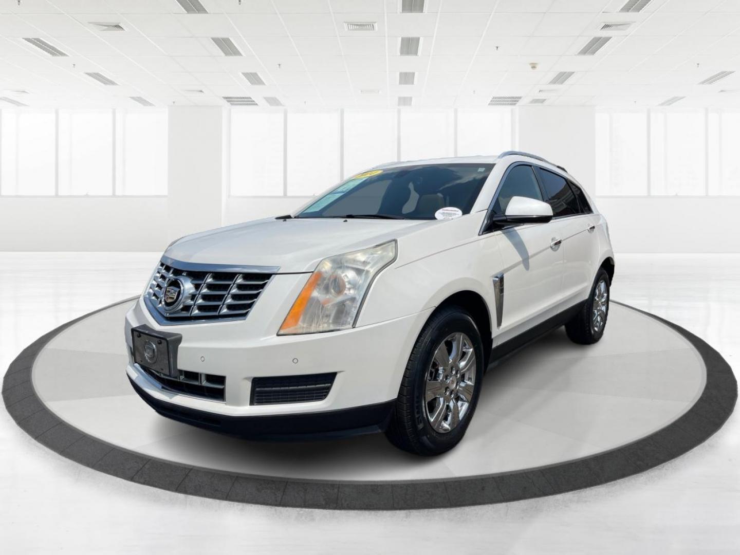 2014 Platinum Ice Tricoat Cadillac SRX (3GYFNEE33ES) with an 3.6L V6 DOHC 24V FFV engine, 6-Speed Automatic transmission, located at 401 Woodman Dr, Riverside, OH, 45431, (937) 908-9800, 39.760899, -84.123421 - Photo#7