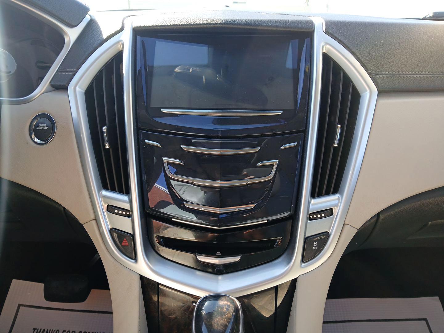 2014 Platinum Ice Tricoat Cadillac SRX Luxury Collection AWD (3GYFNEE30ES) with an 3.6L V6 DOHC 24V FFV engine, 6-Speed Automatic transmission, located at 401 Woodman Dr, Riverside, OH, 45431, (937) 908-9800, 39.760899, -84.123421 - Photo#12