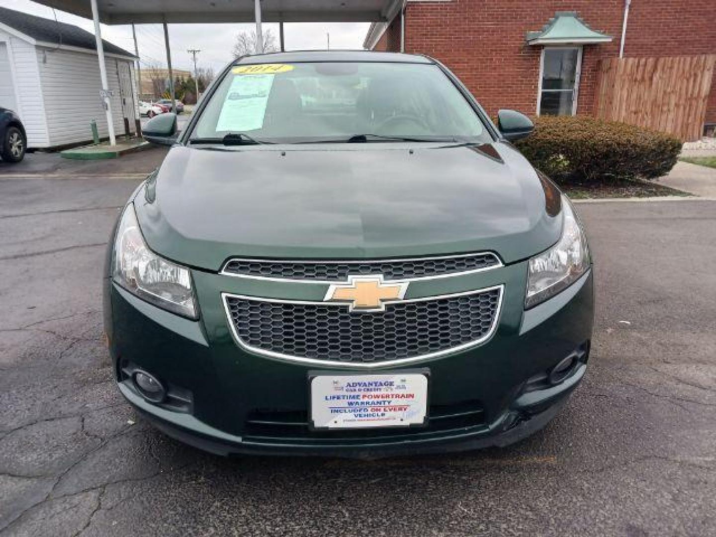 2014 Rainforest Green Metallic Chevrolet Cruze LTZ Auto (1G1PG5SB9E7) with an 1.4L L4 DOHC 16V TURBO engine, 6-Speed Automatic transmission, located at 1099 N County Rd 25A, Troy, OH, 45373, (937) 908-9800, 40.057079, -84.212883 - Photo#1