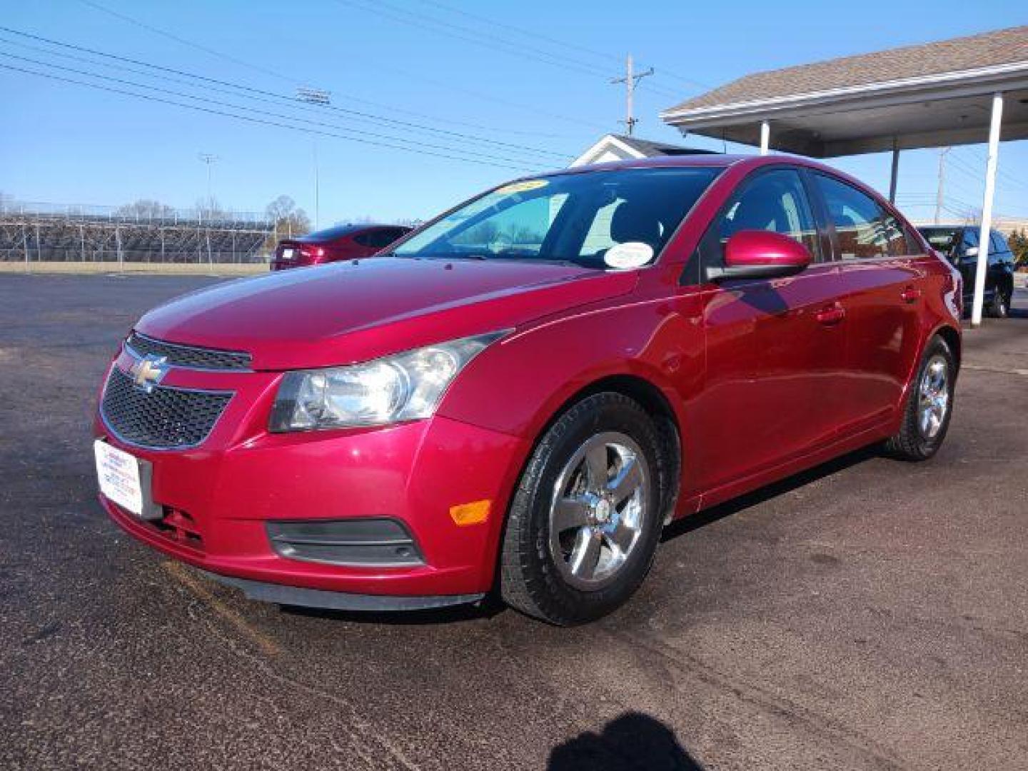 2014 Red Hot Chevrolet Cruze 1LT Auto (1G1PC5SB2E7) with an 1.4L L4 DOHC 16V TURBO engine, 6-Speed Automatic transmission, located at 4508 South Dixie Dr, Moraine, OH, 45439, (937) 908-9800, 39.689976, -84.218452 - Photo#3