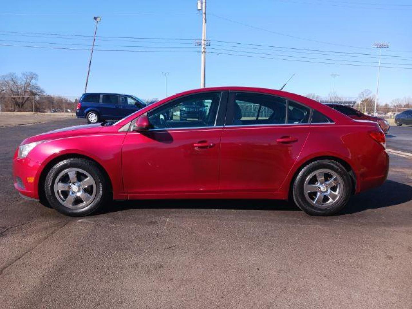 2014 Red Hot Chevrolet Cruze 1LT Auto (1G1PC5SB2E7) with an 1.4L L4 DOHC 16V TURBO engine, 6-Speed Automatic transmission, located at 4508 South Dixie Dr, Moraine, OH, 45439, (937) 908-9800, 39.689976, -84.218452 - Photo#4