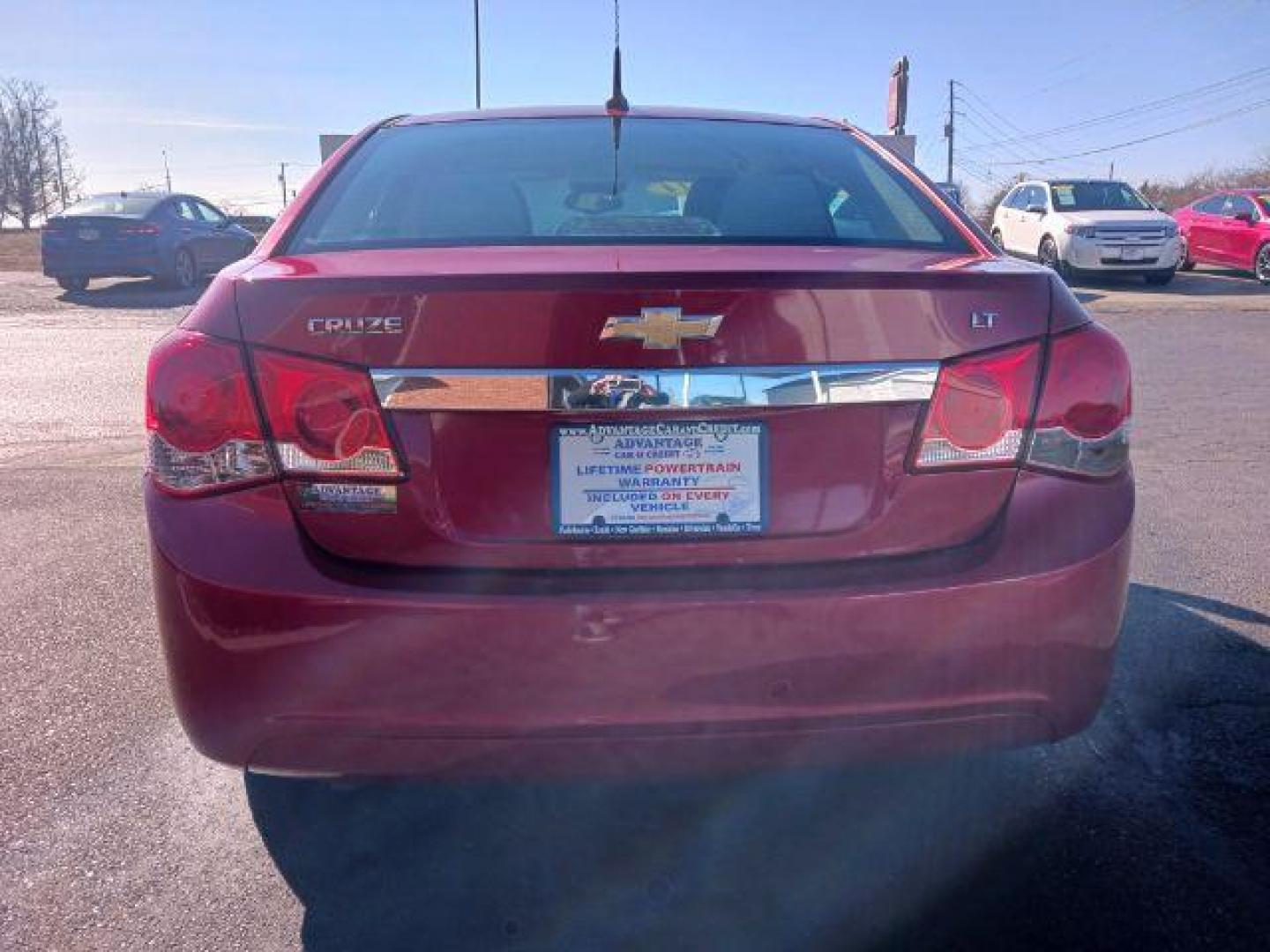 2014 Red Hot Chevrolet Cruze 1LT Auto (1G1PC5SB2E7) with an 1.4L L4 DOHC 16V TURBO engine, 6-Speed Automatic transmission, located at 4508 South Dixie Dr, Moraine, OH, 45439, (937) 908-9800, 39.689976, -84.218452 - Photo#6