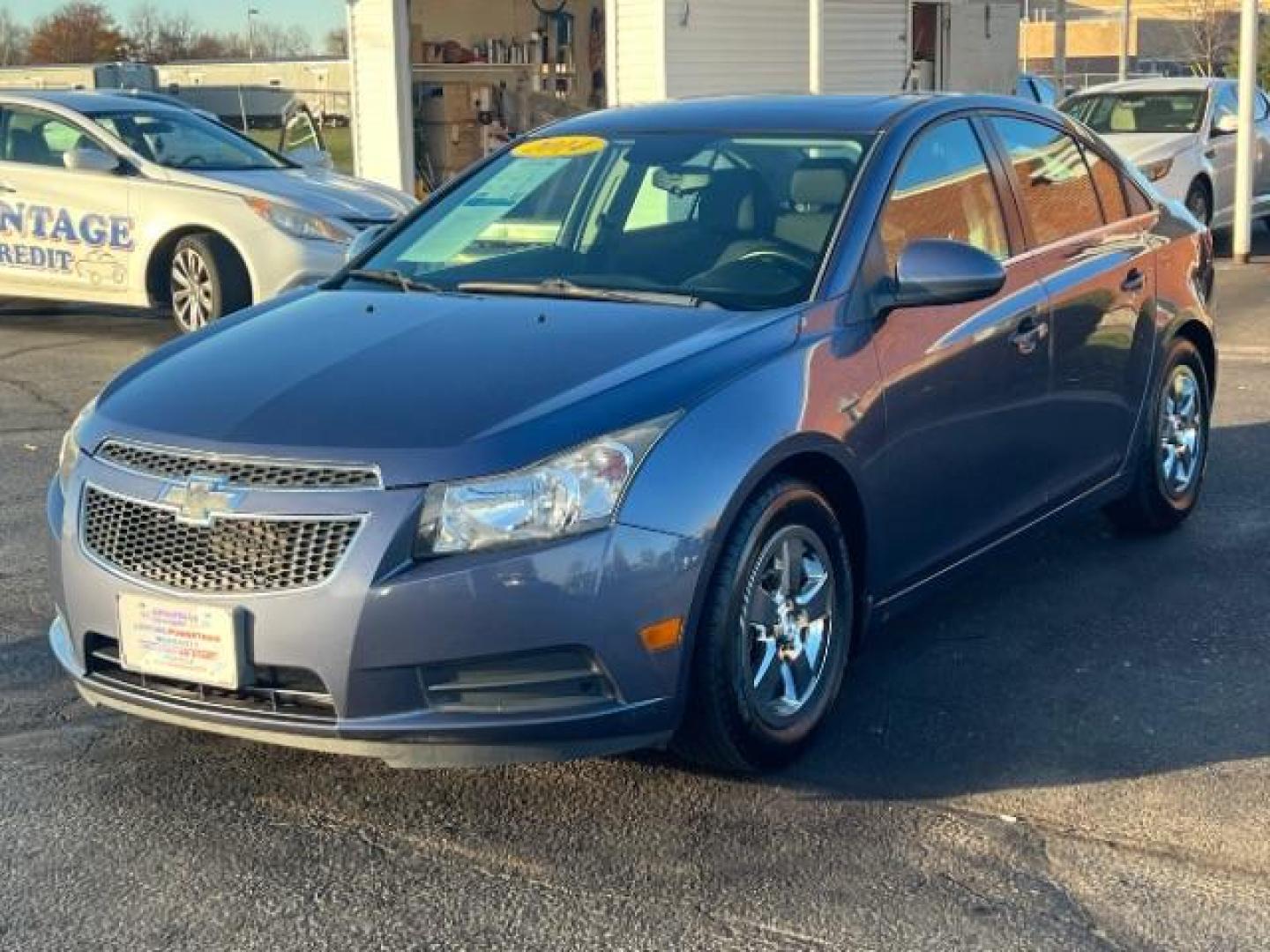 2014 Atlantis Blue Metallic Chevrolet Cruze 1LT Auto (1G1PC5SB8E7) with an 1.4L L4 DOHC 16V TURBO engine, 6-Speed Automatic transmission, located at 1230 East Main St, Xenia, OH, 45385, (937) 908-9800, 39.688026, -83.910172 - Photo#2