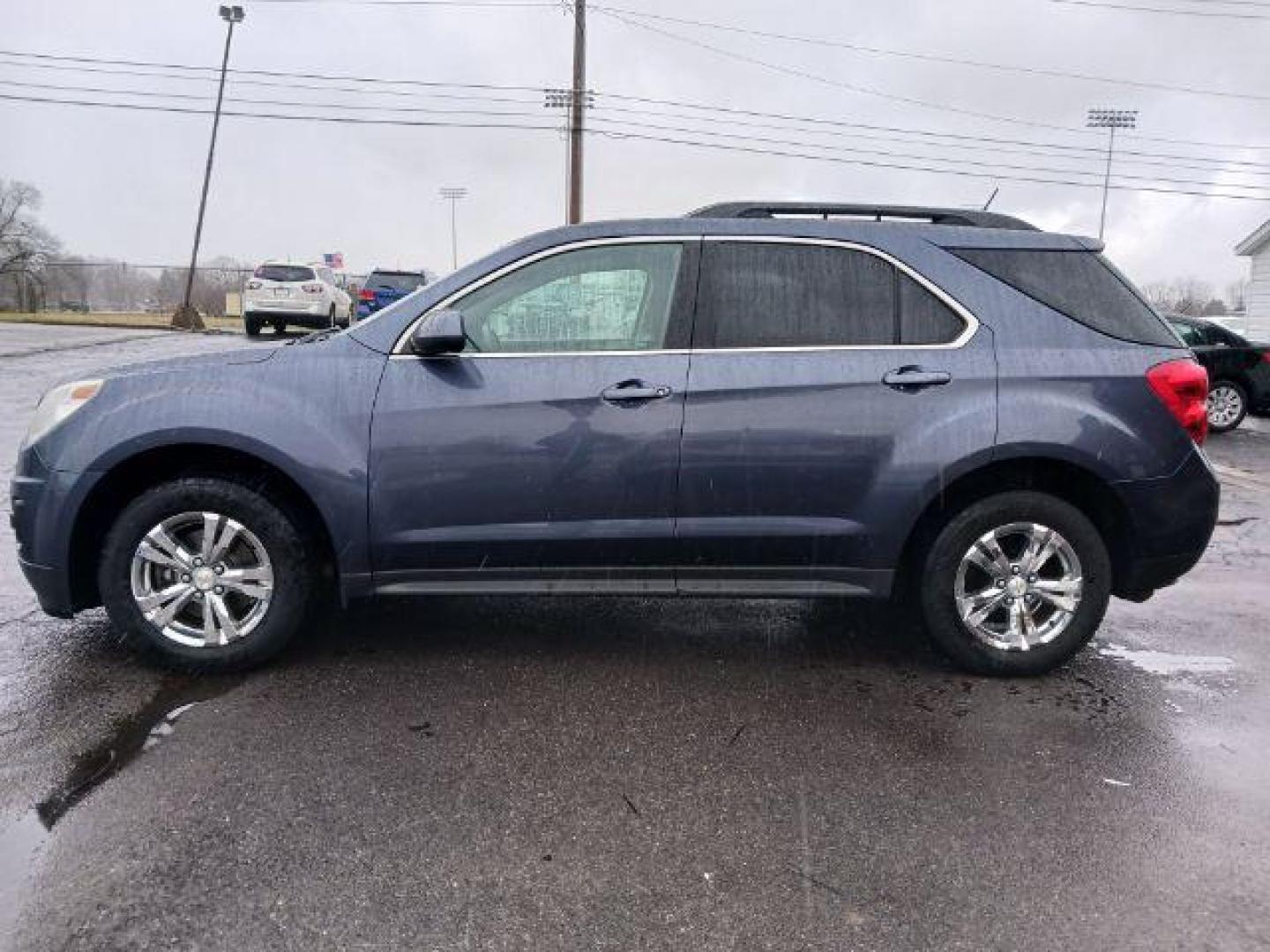 2014 Atlantis Blue Metallic Chevrolet Equinox 1LT 2WD (2GNALBEK2E6) with an 2.4L L4 DOHC 16V FFV engine, 6-Speed Automatic transmission, located at 1184 Kauffman Ave, Fairborn, OH, 45324, (937) 908-9800, 39.807072, -84.030914 - Photo#3