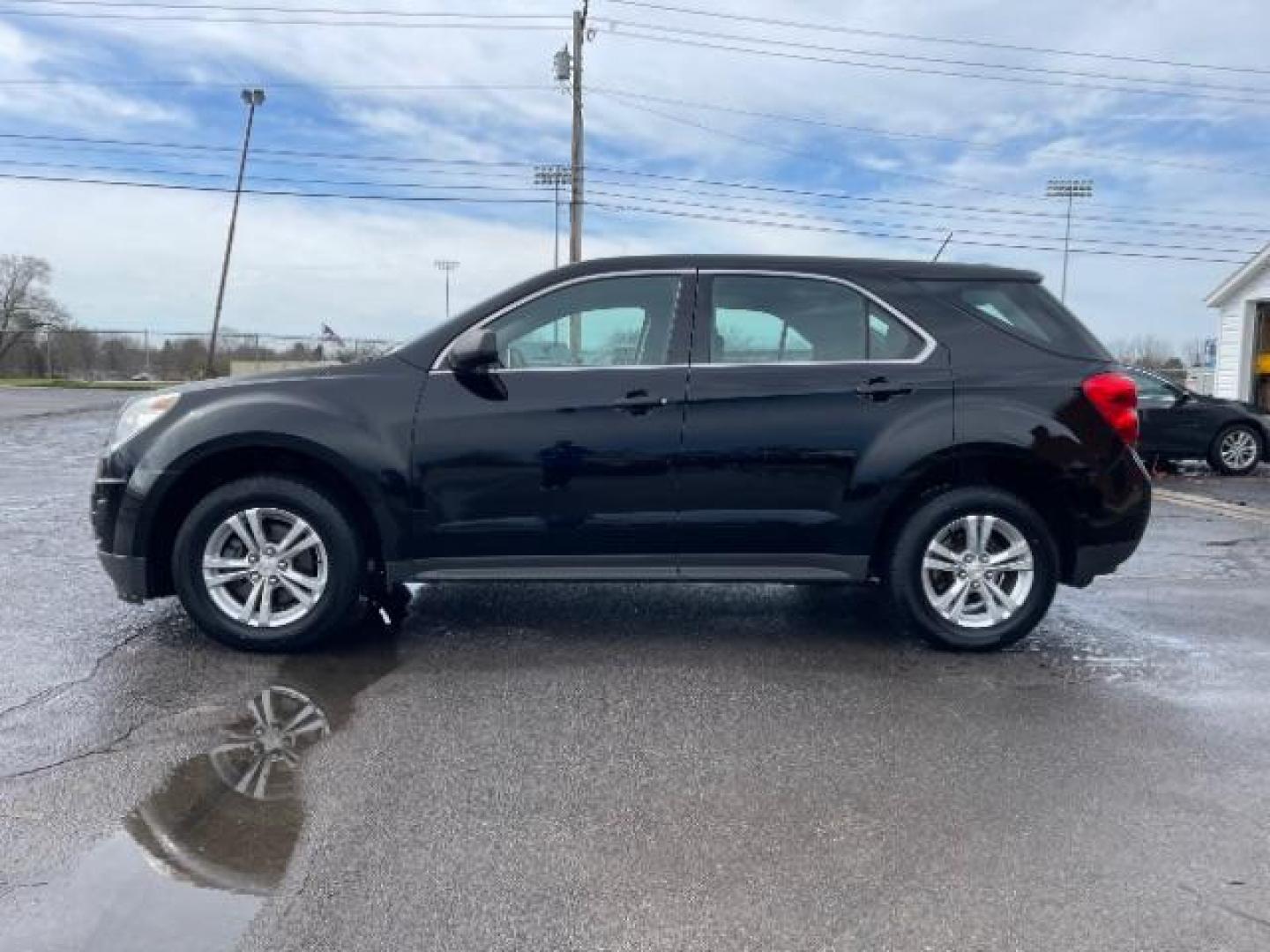 2014 Black Chevrolet Equinox LS 2WD (2GNALAEK3E1) with an 2.4L L4 DOHC 16V FFV engine, 6-Speed Automatic transmission, located at 880 E. National Road, Vandalia, OH, 45377, (937) 908-9800, 39.891918, -84.183594 - Photo#5