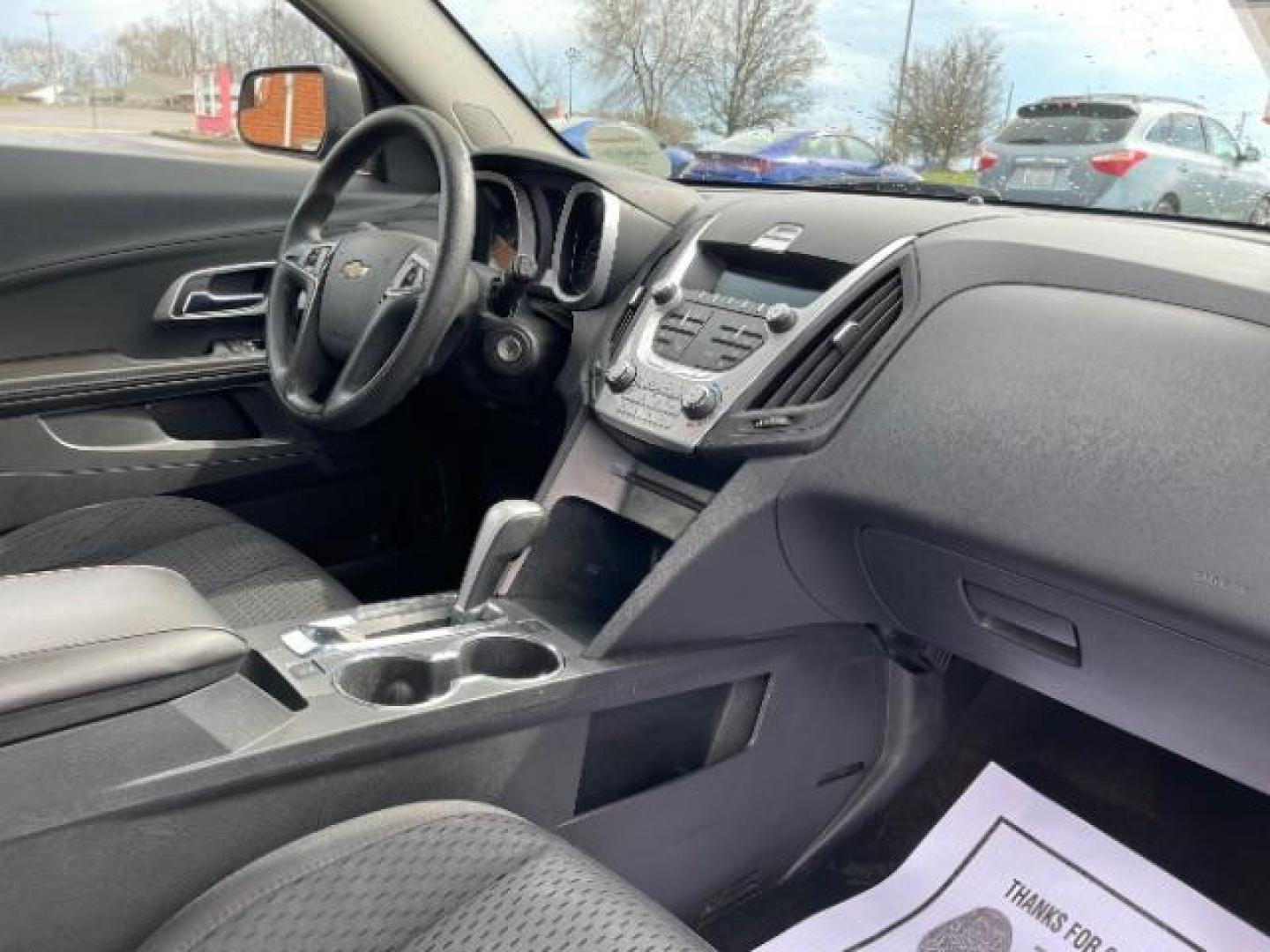 2014 Black Chevrolet Equinox LS 2WD (2GNALAEK3E1) with an 2.4L L4 DOHC 16V FFV engine, 6-Speed Automatic transmission, located at 880 E. National Road, Vandalia, OH, 45377, (937) 908-9800, 39.891918, -84.183594 - Photo#7