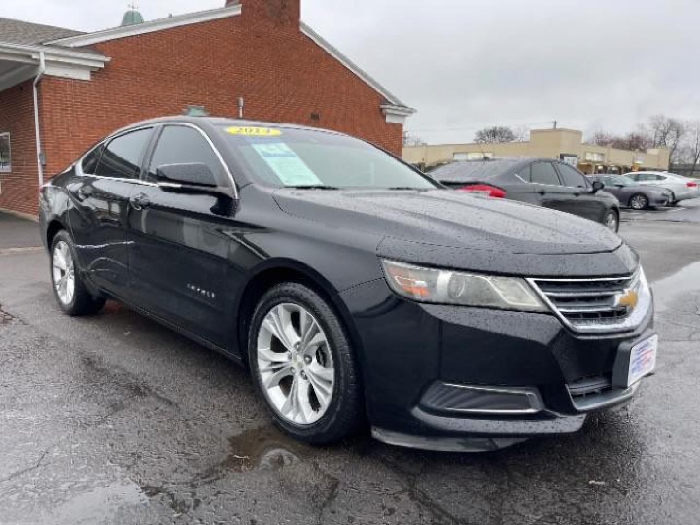 2014 Black Chevrolet Impala 2LT (2G1125S32E9) with an 3.6L V6 DOHC 24VV FFV engine, 6-Speed Automatic transmission, located at 1184 Kauffman Ave, Fairborn, OH, 45324, (937) 908-9800, 39.807072, -84.030914 - Photo#0