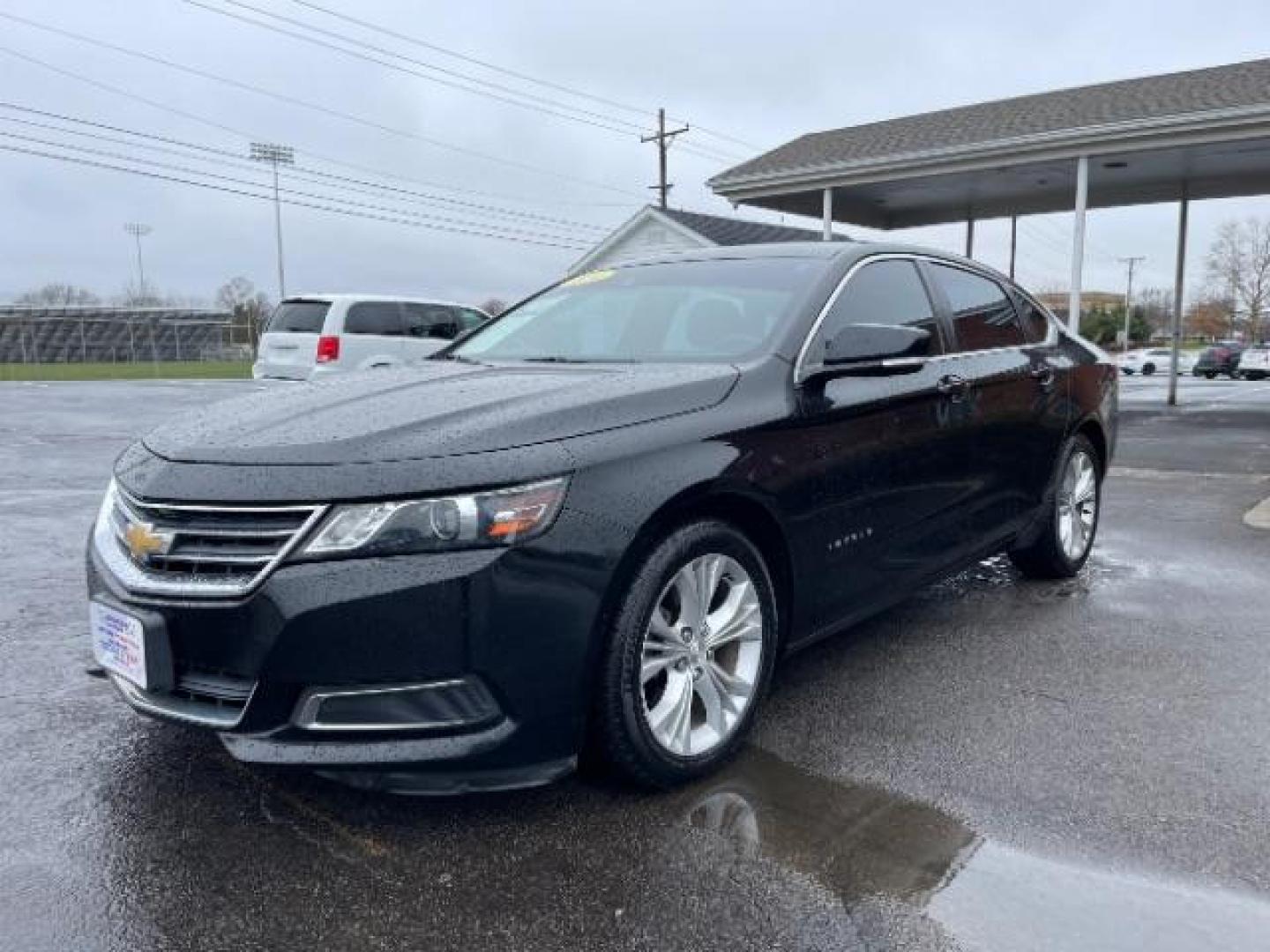 2014 Black Chevrolet Impala 2LT (2G1125S32E9) with an 3.6L V6 DOHC 24VV FFV engine, 6-Speed Automatic transmission, located at 1184 Kauffman Ave, Fairborn, OH, 45324, (937) 908-9800, 39.807072, -84.030914 - Photo#1