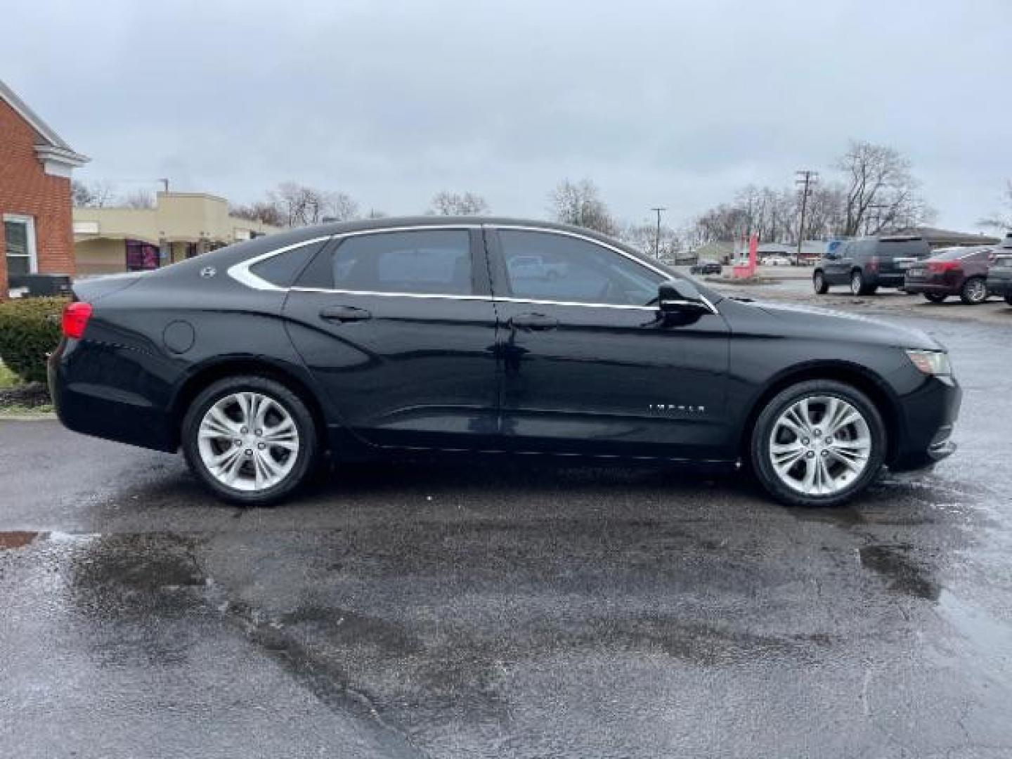 2014 Black Chevrolet Impala 2LT (2G1125S32E9) with an 3.6L V6 DOHC 24VV FFV engine, 6-Speed Automatic transmission, located at 1184 Kauffman Ave, Fairborn, OH, 45324, (937) 908-9800, 39.807072, -84.030914 - Photo#3