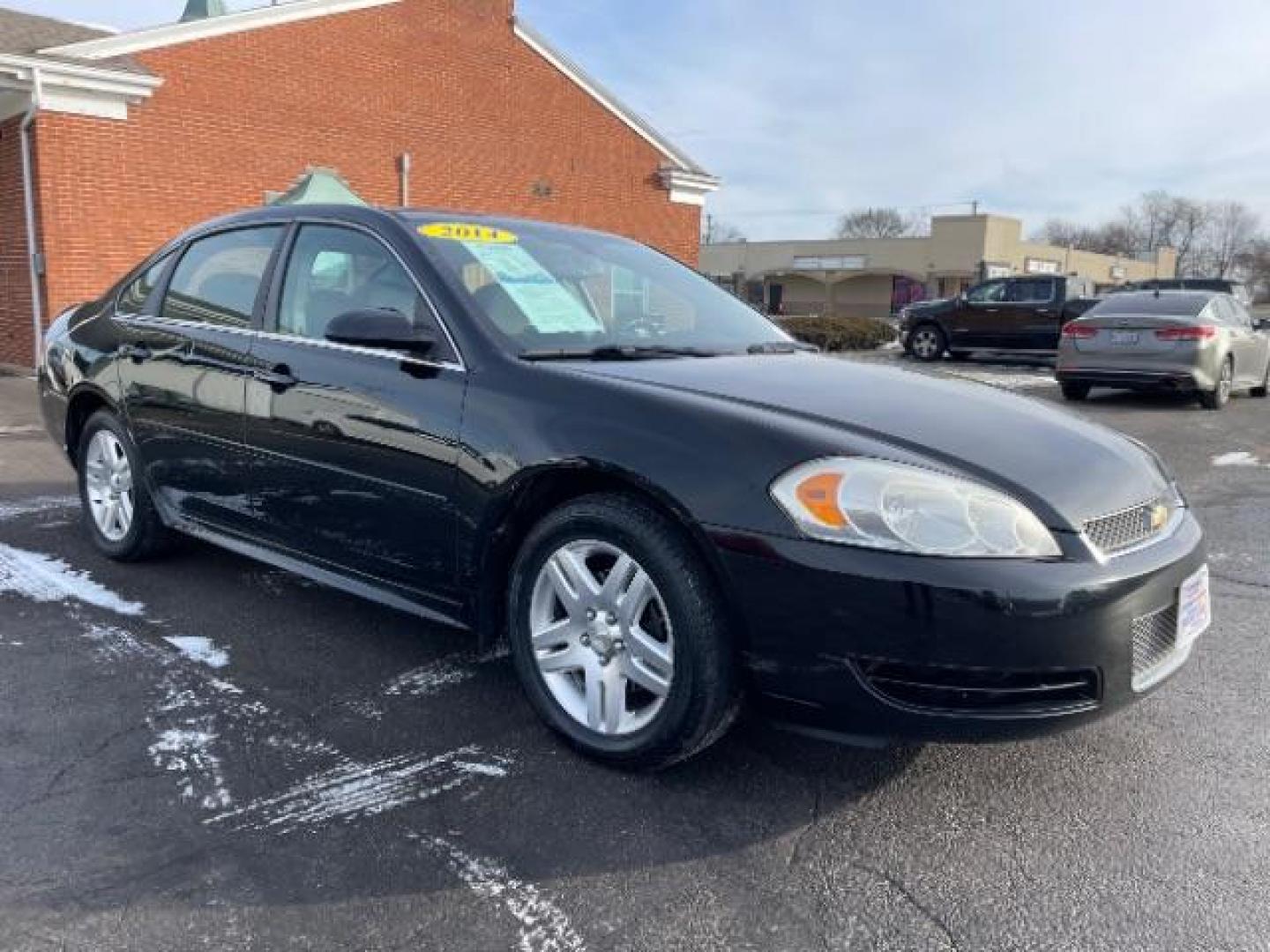 2014 Black Chevrolet Impala Limited LT (2G1WB5E37E1) with an 3.6L V6 DOHC 16V FFV engine, 6-Speed Automatic transmission, located at 1099 N County Rd 25A, Troy, OH, 45373, (937) 908-9800, 40.057079, -84.212883 - Photo#0