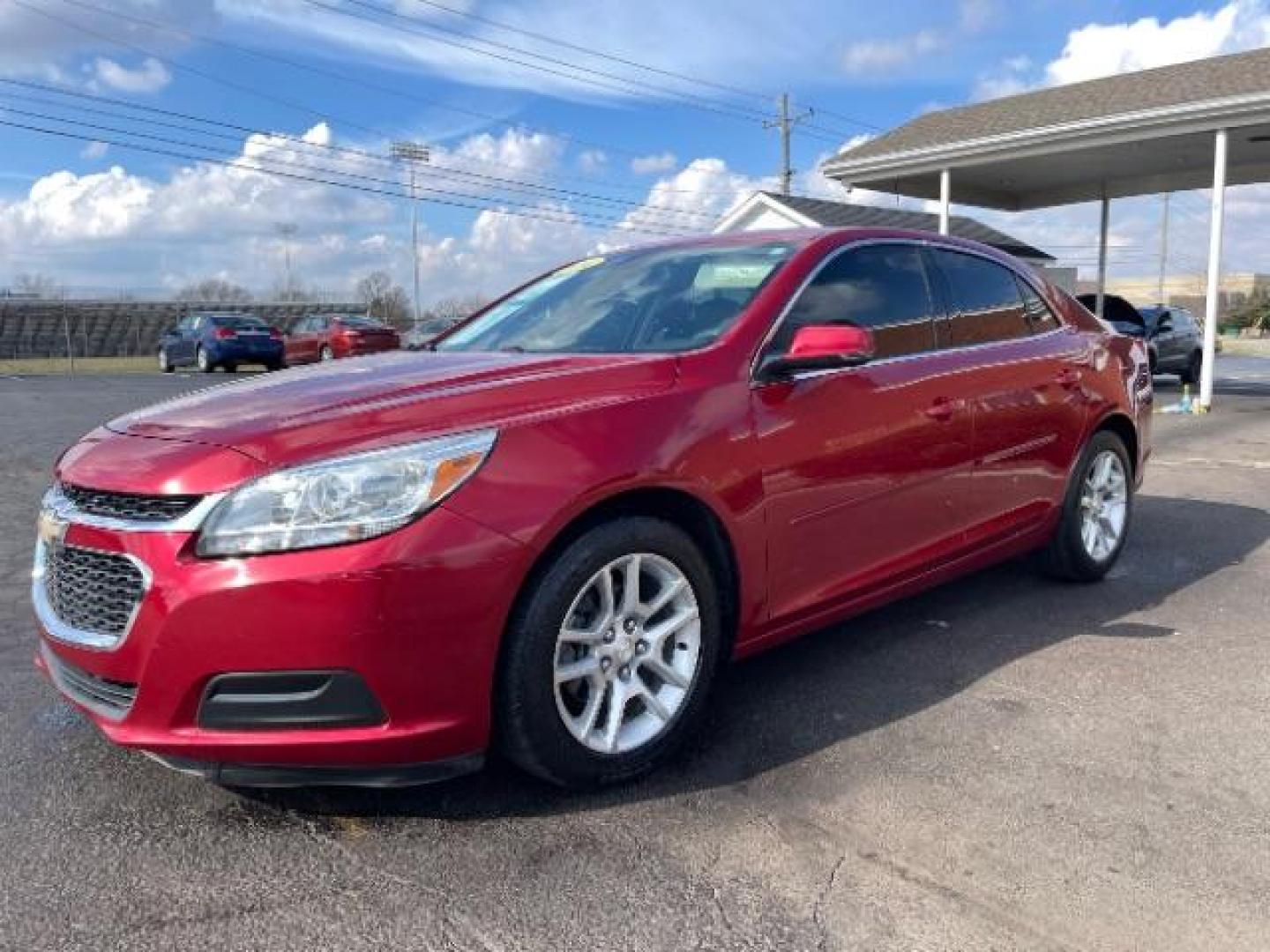 2014 Butte Red Metallic Chevrolet Malibu 1LT (1G11C5SL7EF) with an 2.5L L4 DOHC 16V engine, 6-Speed Automatic transmission, located at 401 Woodman Dr, Riverside, OH, 45431, (937) 908-9800, 39.760899, -84.123421 - Photo#1