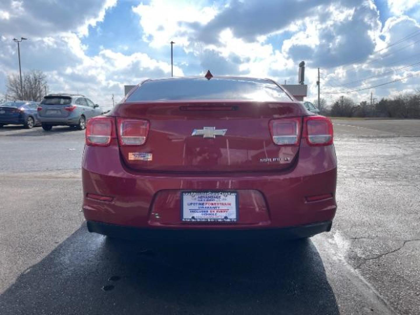 2014 Butte Red Metallic Chevrolet Malibu 1LT (1G11C5SL7EF) with an 2.5L L4 DOHC 16V engine, 6-Speed Automatic transmission, located at 401 Woodman Dr, Riverside, OH, 45431, (937) 908-9800, 39.760899, -84.123421 - Photo#5