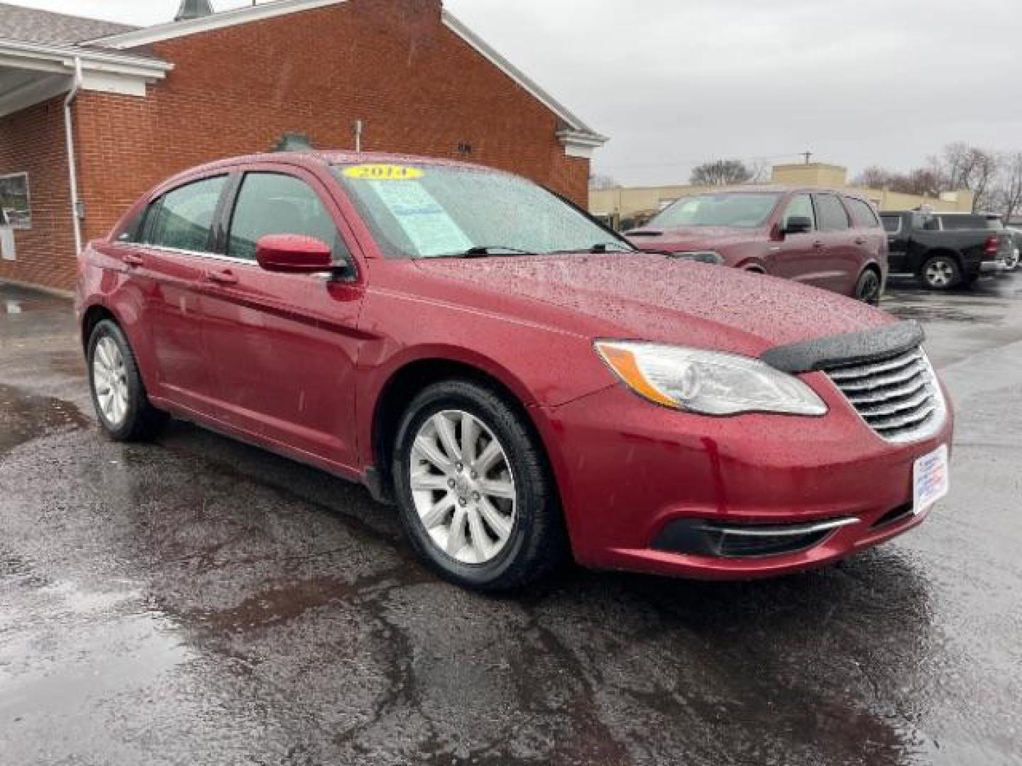 2014 Dp Cherry Red Crystal PC Chrysler 200 Touring (1C3CCBBG0EN) with an 3.6L V6 DOHC 24V FFV engine, 6-Speed Automatic transmission, located at 401 Woodman Dr, Riverside, OH, 45431, (937) 908-9800, 39.760899, -84.123421 - Photo#0