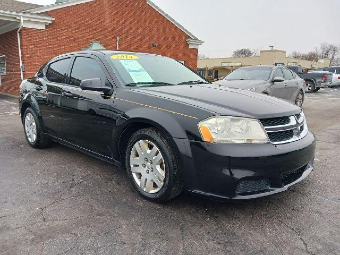 2014 Black Clearcoat Dodge Avenger SE (1C3CDZAB1EN) with an 2.4L L4 DOHC 16V engine, 4-Speed Automatic transmission, located at 1184 Kauffman Ave, Fairborn, OH, 45324, (937) 908-9800, 39.807072, -84.030914 - Photo#0