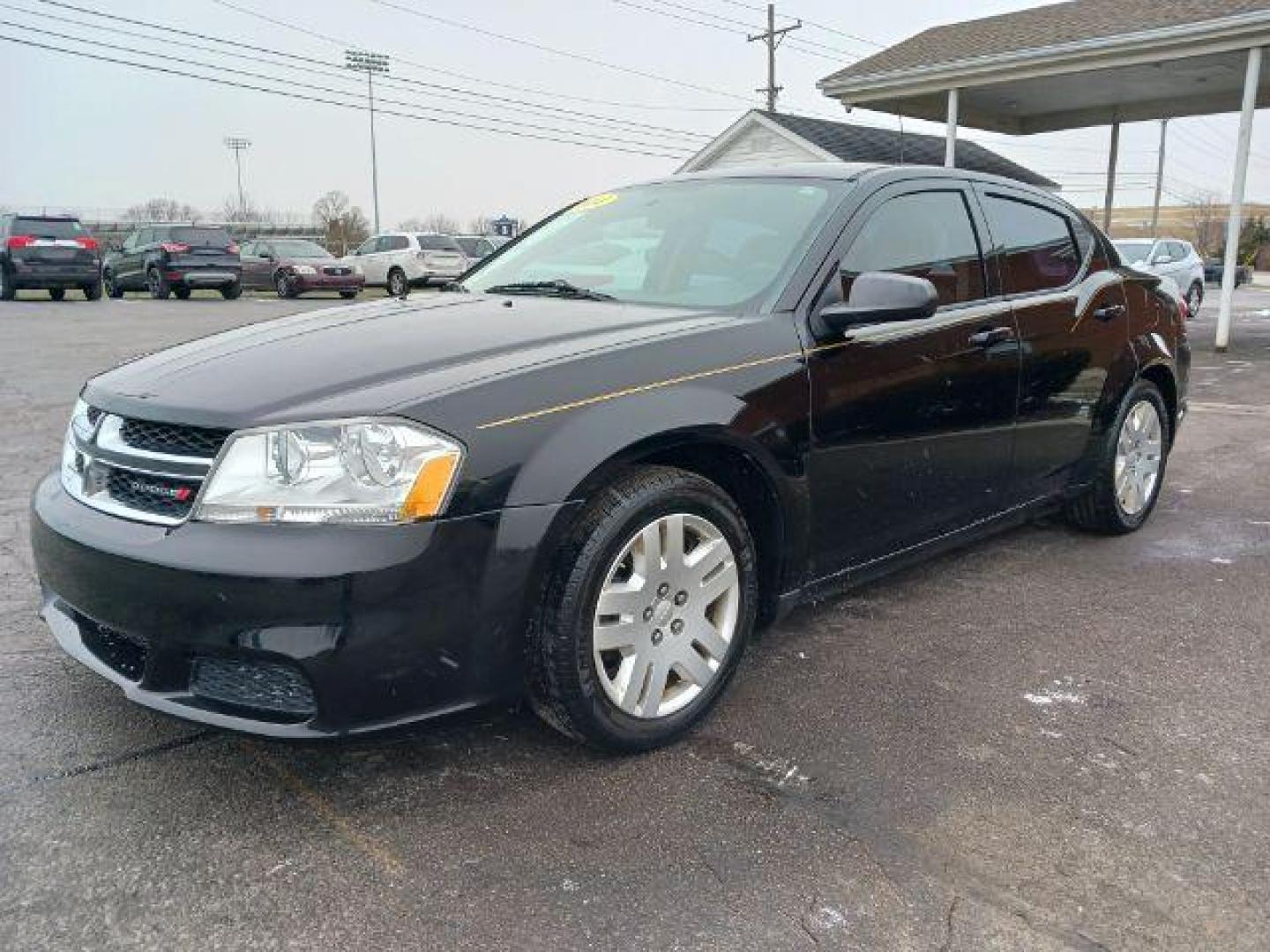 2014 Black Clearcoat Dodge Avenger SE (1C3CDZAB1EN) with an 2.4L L4 DOHC 16V engine, 4-Speed Automatic transmission, located at 1184 Kauffman Ave, Fairborn, OH, 45324, (937) 908-9800, 39.807072, -84.030914 - Photo#2