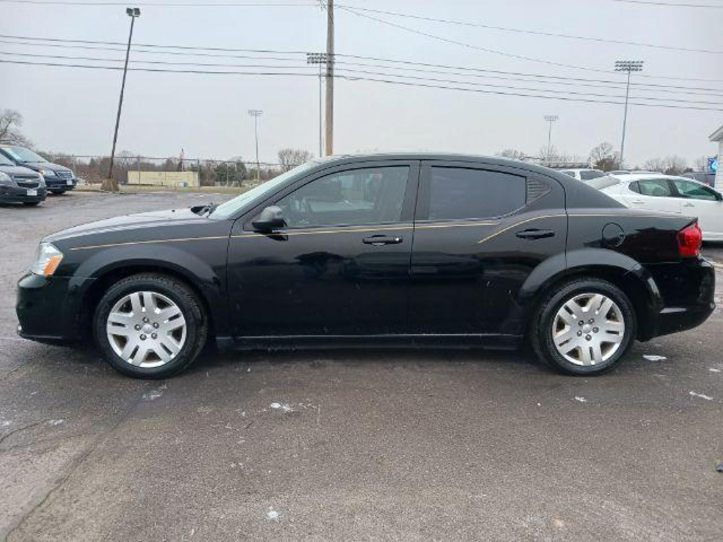 2014 Black Clearcoat Dodge Avenger SE (1C3CDZAB1EN) with an 2.4L L4 DOHC 16V engine, 4-Speed Automatic transmission, located at 1184 Kauffman Ave, Fairborn, OH, 45324, (937) 908-9800, 39.807072, -84.030914 - Photo#3