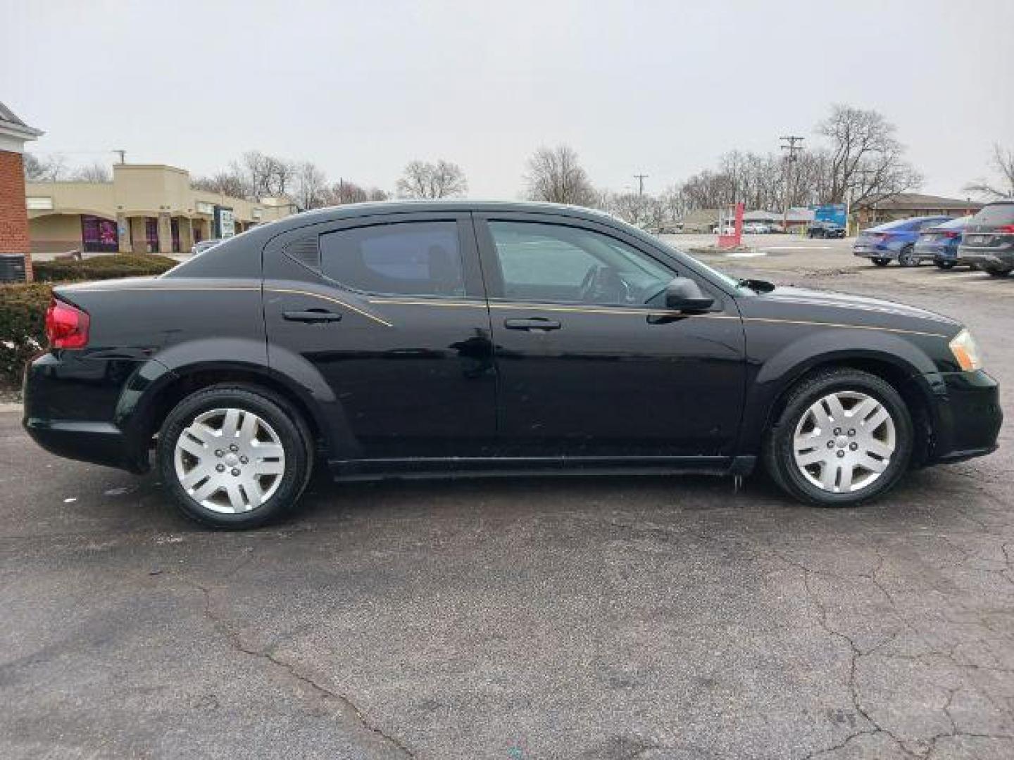 2014 Black Clearcoat Dodge Avenger SE (1C3CDZAB1EN) with an 2.4L L4 DOHC 16V engine, 4-Speed Automatic transmission, located at 1184 Kauffman Ave, Fairborn, OH, 45324, (937) 908-9800, 39.807072, -84.030914 - Photo#4