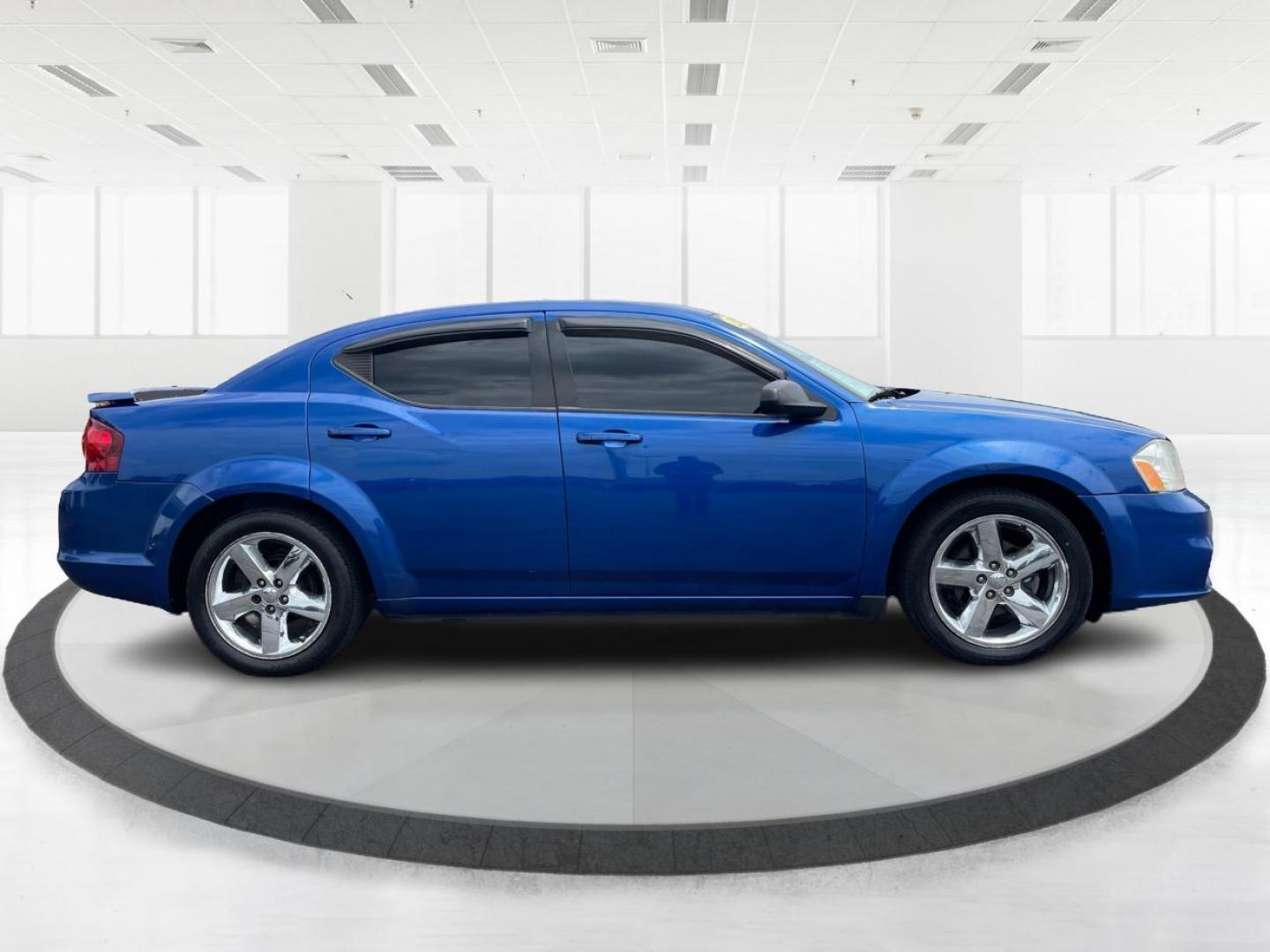 2014 Blue Streak Pearlcoat Dodge Avenger SE (1C3CDZAG1EN) with an 3.6L V6 DOHC 24V FFV engine, 6-Speed Automatic transmission, located at 1099 N County Rd 25A, Troy, OH, 45373, (937) 908-9800, 40.057079, -84.212883 - Photo#1