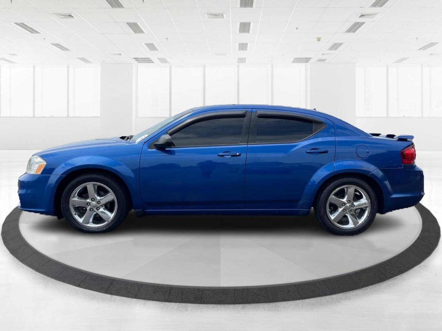 2014 Blue Streak Pearlcoat Dodge Avenger SE (1C3CDZAG1EN) with an 3.6L V6 DOHC 24V FFV engine, 6-Speed Automatic transmission, located at 1099 N County Rd 25A, Troy, OH, 45373, (937) 908-9800, 40.057079, -84.212883 - Photo#5