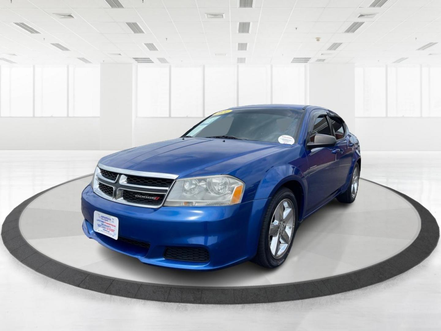 2014 Blue Streak Pearlcoat Dodge Avenger SE (1C3CDZAG1EN) with an 3.6L V6 DOHC 24V FFV engine, 6-Speed Automatic transmission, located at 1099 N County Rd 25A, Troy, OH, 45373, (937) 908-9800, 40.057079, -84.212883 - Photo#7