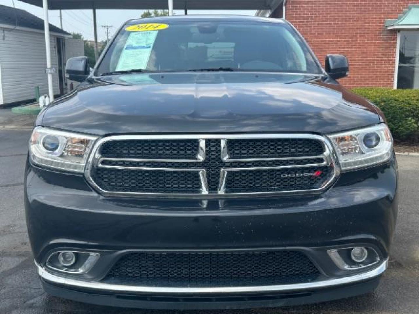 2014 Granite Crystal Met CC Dodge Durango Limited AWD (1C4RDJDG3EC) with an 3.6L V6 DOHC 24V engine, 8-Speed Automatic transmission, located at 1099 N County Rd 25A, Troy, OH, 45373, (937) 908-9800, 40.057079, -84.212883 - Third Row - Photo#1