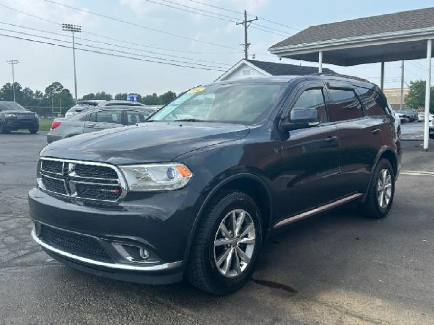 2014 Granite Crystal Met CC Dodge Durango Limited AWD (1C4RDJDG3EC) with an 3.6L V6 DOHC 24V engine, 8-Speed Automatic transmission, located at 1099 N County Rd 25A, Troy, OH, 45373, (937) 908-9800, 40.057079, -84.212883 - Third Row - Photo#2