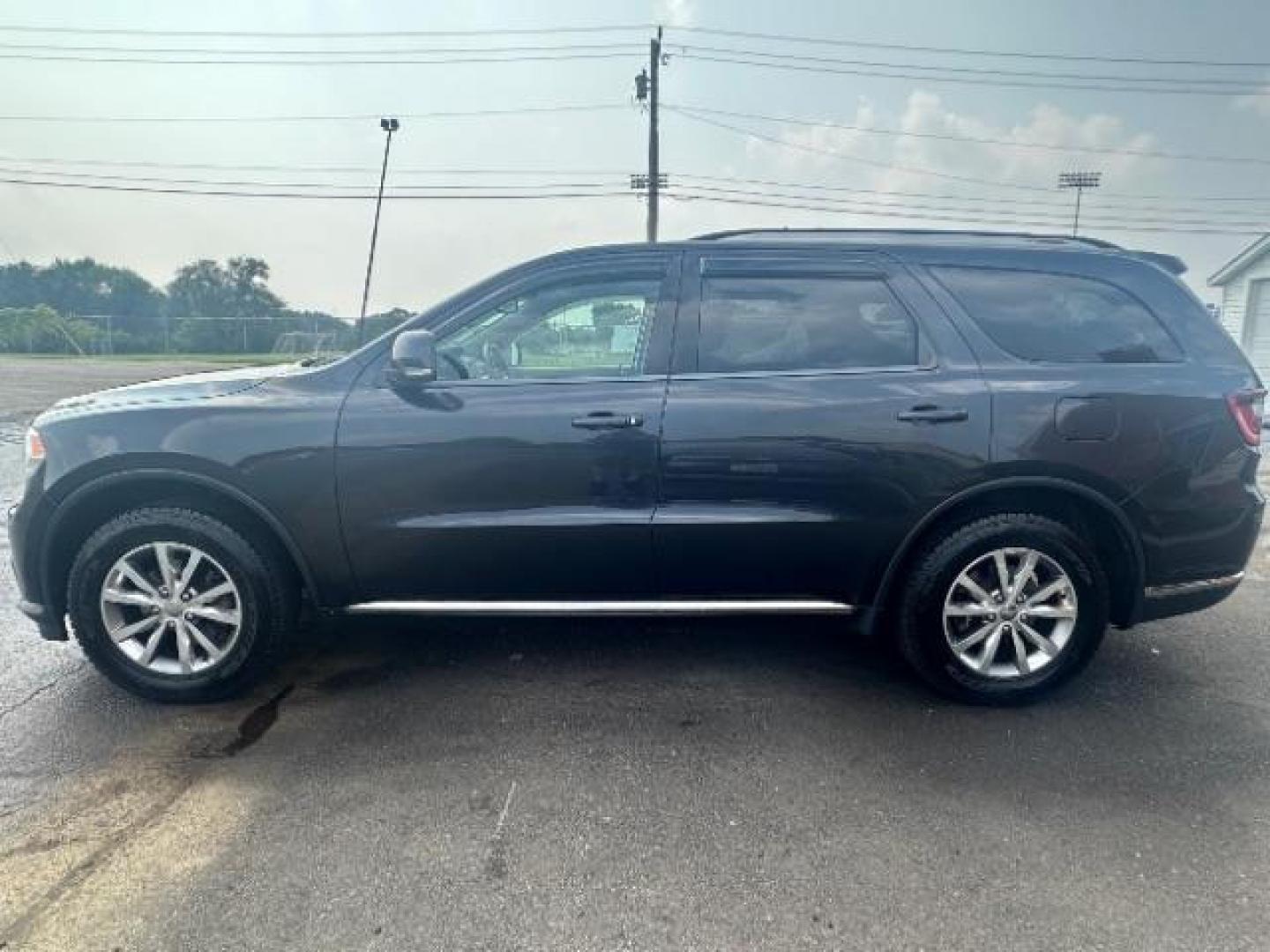 2014 Granite Crystal Met CC Dodge Durango Limited AWD (1C4RDJDG3EC) with an 3.6L V6 DOHC 24V engine, 8-Speed Automatic transmission, located at 1099 N County Rd 25A, Troy, OH, 45373, (937) 908-9800, 40.057079, -84.212883 - Third Row - Photo#3