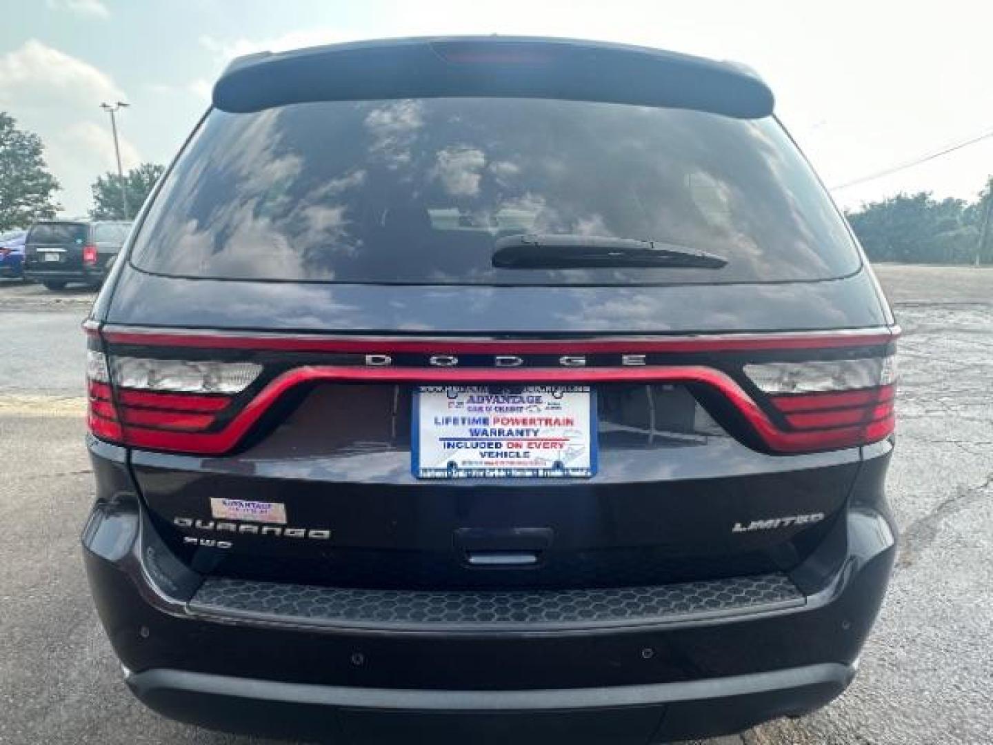 2014 Granite Crystal Met CC Dodge Durango Limited AWD (1C4RDJDG3EC) with an 3.6L V6 DOHC 24V engine, 8-Speed Automatic transmission, located at 1099 N County Rd 25A, Troy, OH, 45373, (937) 908-9800, 40.057079, -84.212883 - Third Row - Photo#4