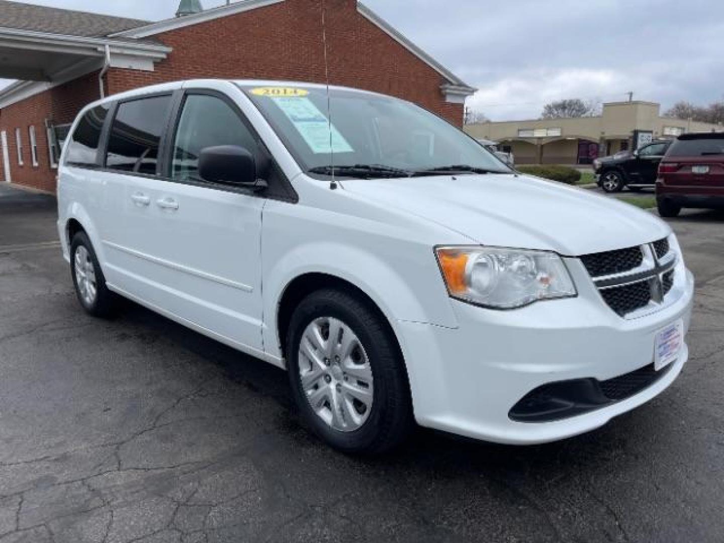 2014 Bright White Clearcoat Dodge Grand Caravan SE (2C4RDGBG9ER) with an 3.6L V6 DOHC 24V engine, 6-Speed Automatic transmission, located at 4508 South Dixie Dr, Moraine, OH, 45439, (937) 908-9800, 39.689976, -84.218452 - Photo#0