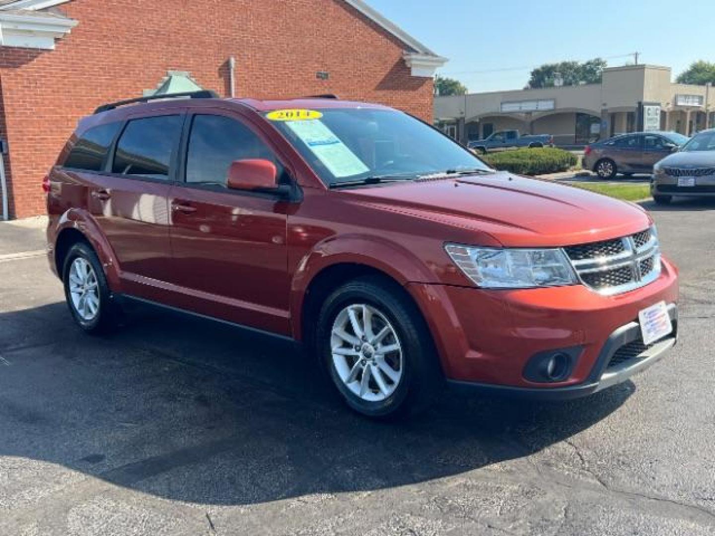 2014 Copperhead Pearlcoat Dodge Journey SXT (3C4PDCBB5ET) with an 2.4L L6 DOHC 16V engine, 4-Speed Automatic transmission, located at 1099 N County Rd 25A, Troy, OH, 45373, (937) 908-9800, 40.057079, -84.212883 - Photo#0