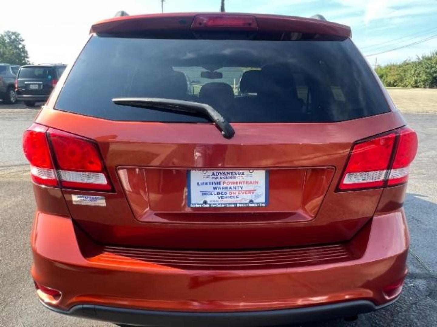 2014 Copperhead Pearlcoat Dodge Journey SXT (3C4PDCBB5ET) with an 2.4L L6 DOHC 16V engine, 4-Speed Automatic transmission, located at 1099 N County Rd 25A, Troy, OH, 45373, (937) 908-9800, 40.057079, -84.212883 - Photo#4