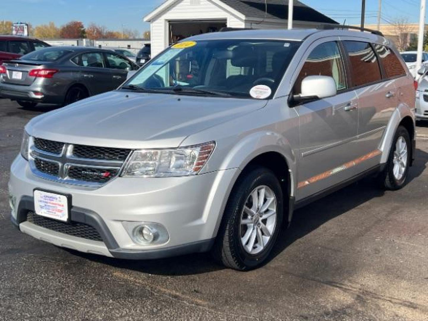 2014 Bright Silver Metallic CC Dodge Journey SXT (3C4PDCBG5ET) with an 3.6L V6 DOHC 24V engine, 6-Speed Automatic transmission, located at 401 Woodman Dr, Riverside, OH, 45431, (937) 908-9800, 39.760899, -84.123421 - Photo#2