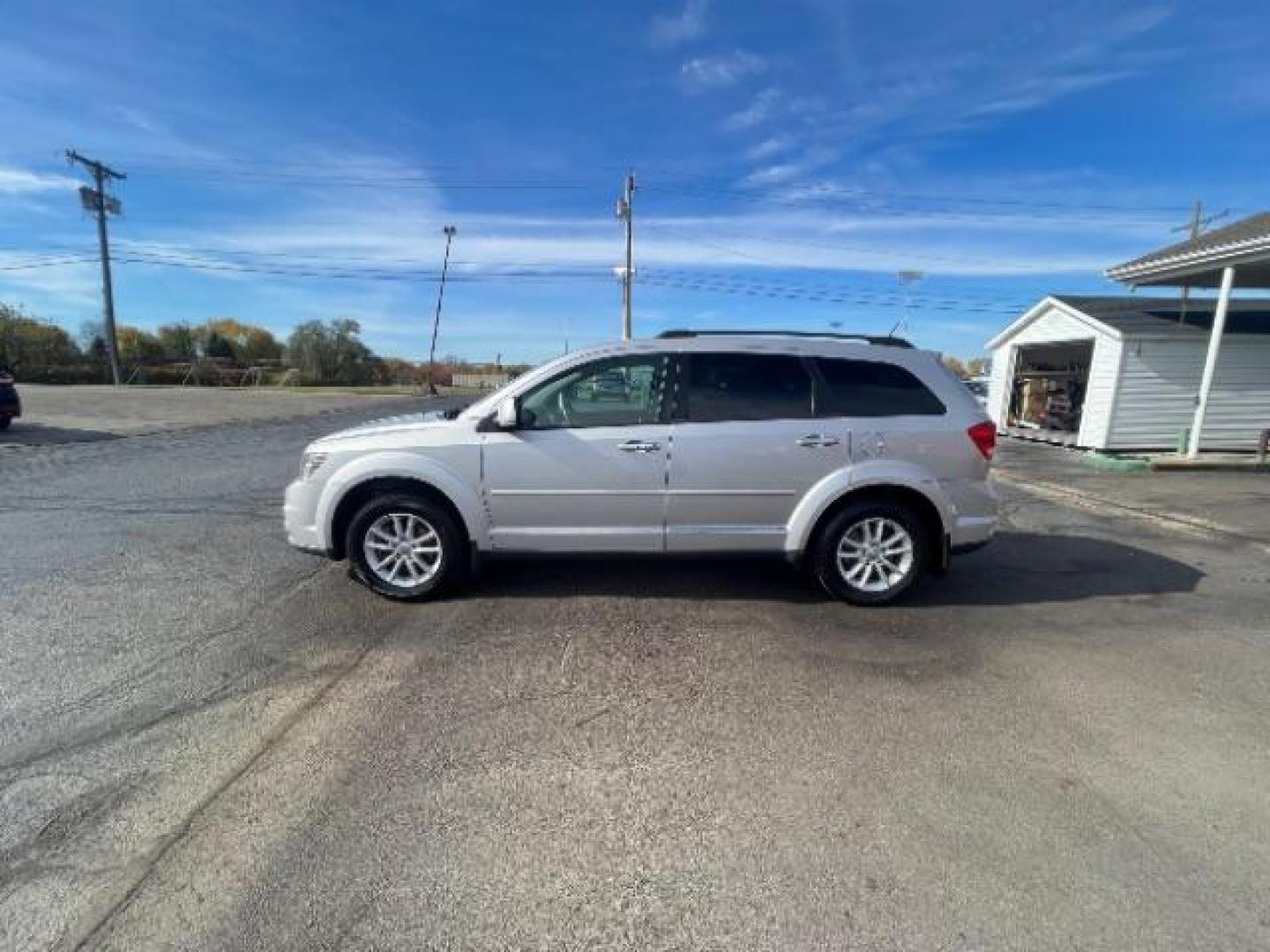 2014 Bright Silver Metallic CC Dodge Journey SXT (3C4PDCBG5ET) with an 3.6L V6 DOHC 24V engine, 6-Speed Automatic transmission, located at 401 Woodman Dr, Riverside, OH, 45431, (937) 908-9800, 39.760899, -84.123421 - Photo#3