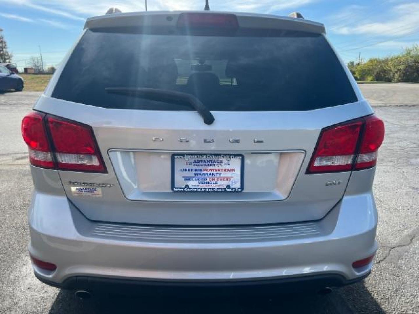 2014 Bright Silver Metallic CC Dodge Journey SXT (3C4PDCBG5ET) with an 3.6L V6 DOHC 24V engine, 6-Speed Automatic transmission, located at 401 Woodman Dr, Riverside, OH, 45431, (937) 908-9800, 39.760899, -84.123421 - Photo#4