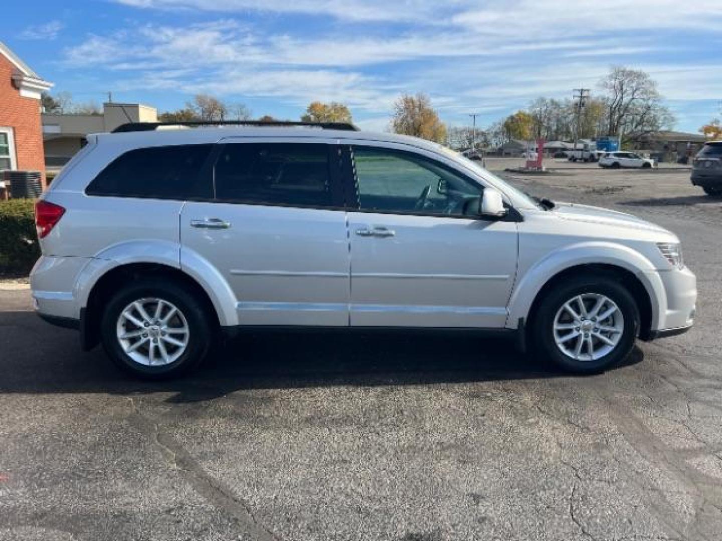 2014 Bright Silver Metallic CC Dodge Journey SXT (3C4PDCBG5ET) with an 3.6L V6 DOHC 24V engine, 6-Speed Automatic transmission, located at 401 Woodman Dr, Riverside, OH, 45431, (937) 908-9800, 39.760899, -84.123421 - Photo#5