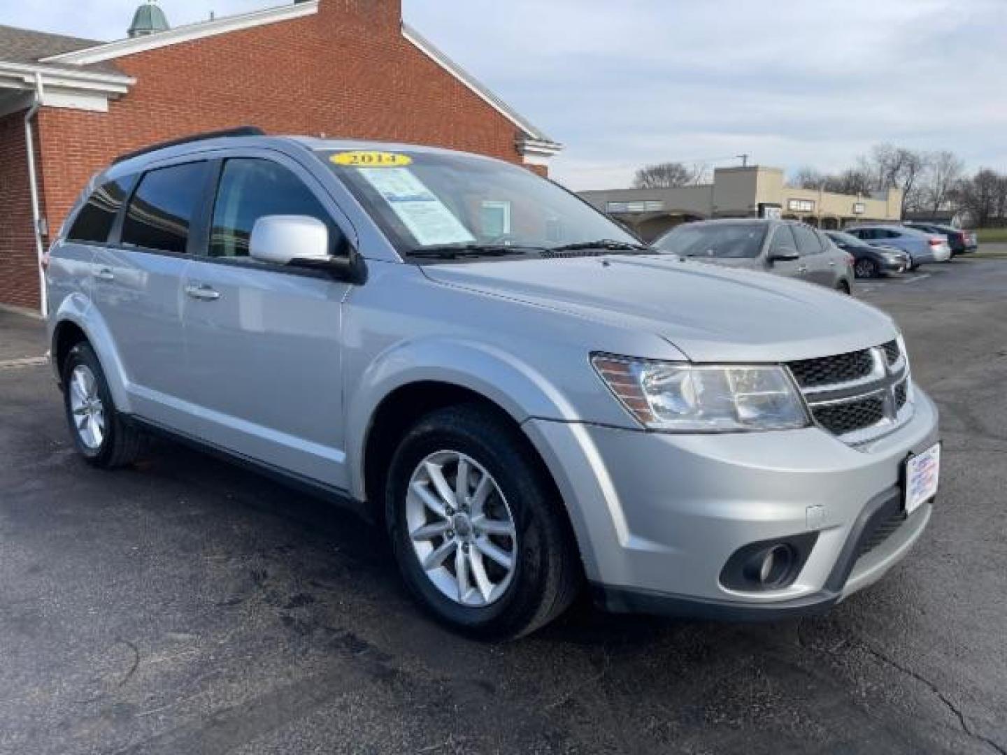 2014 Bright Silver Metallic CC Dodge Journey SXT (3C4PDCBG0ET) with an 3.6L V6 DOHC 24V engine, 6-Speed Automatic transmission, located at 401 Woodman Dr, Riverside, OH, 45431, (937) 908-9800, 39.760899, -84.123421 - Photo#0