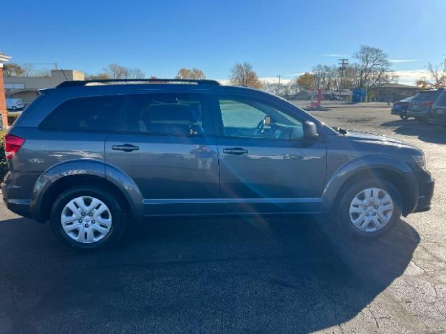 2014 Granite Crystal Met CC Dodge Journey SE (3C4PDCAB7ET) with an 2.4L L4 DOHC 16V engine, 4-Speed Automatic transmission, located at 4508 South Dixie Dr, Moraine, OH, 45439, (937) 908-9800, 39.689976, -84.218452 - Photo#5