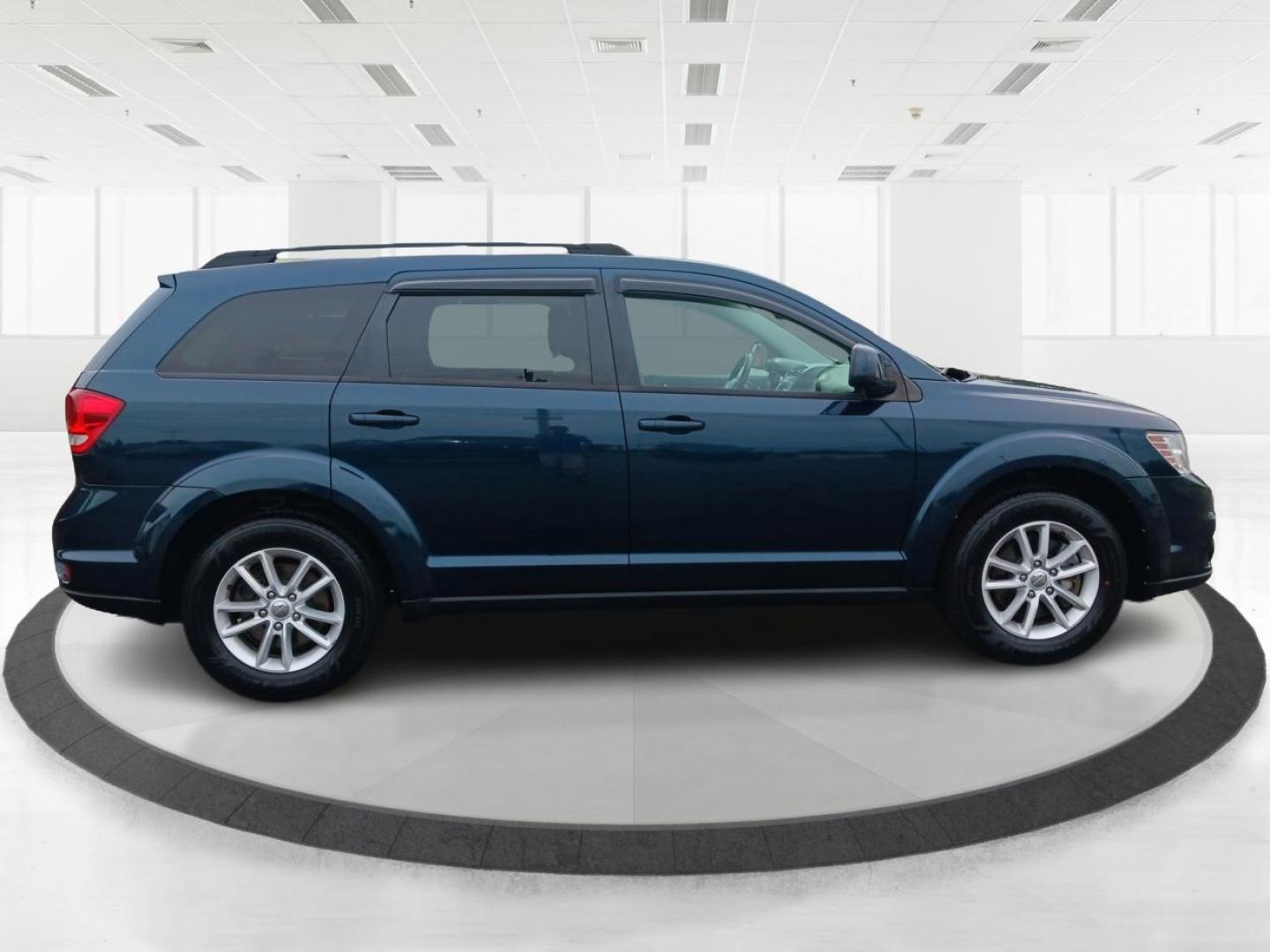 2014 Fathom Blue Pearlcoat Dodge Journey (3C4PDCBB1ET) with an 2.4L L6 DOHC 16V engine, 4-Speed Automatic transmission, located at 401 Woodman Dr, Riverside, OH, 45431, (937) 908-9800, 39.760899, -84.123421 - Photo#1